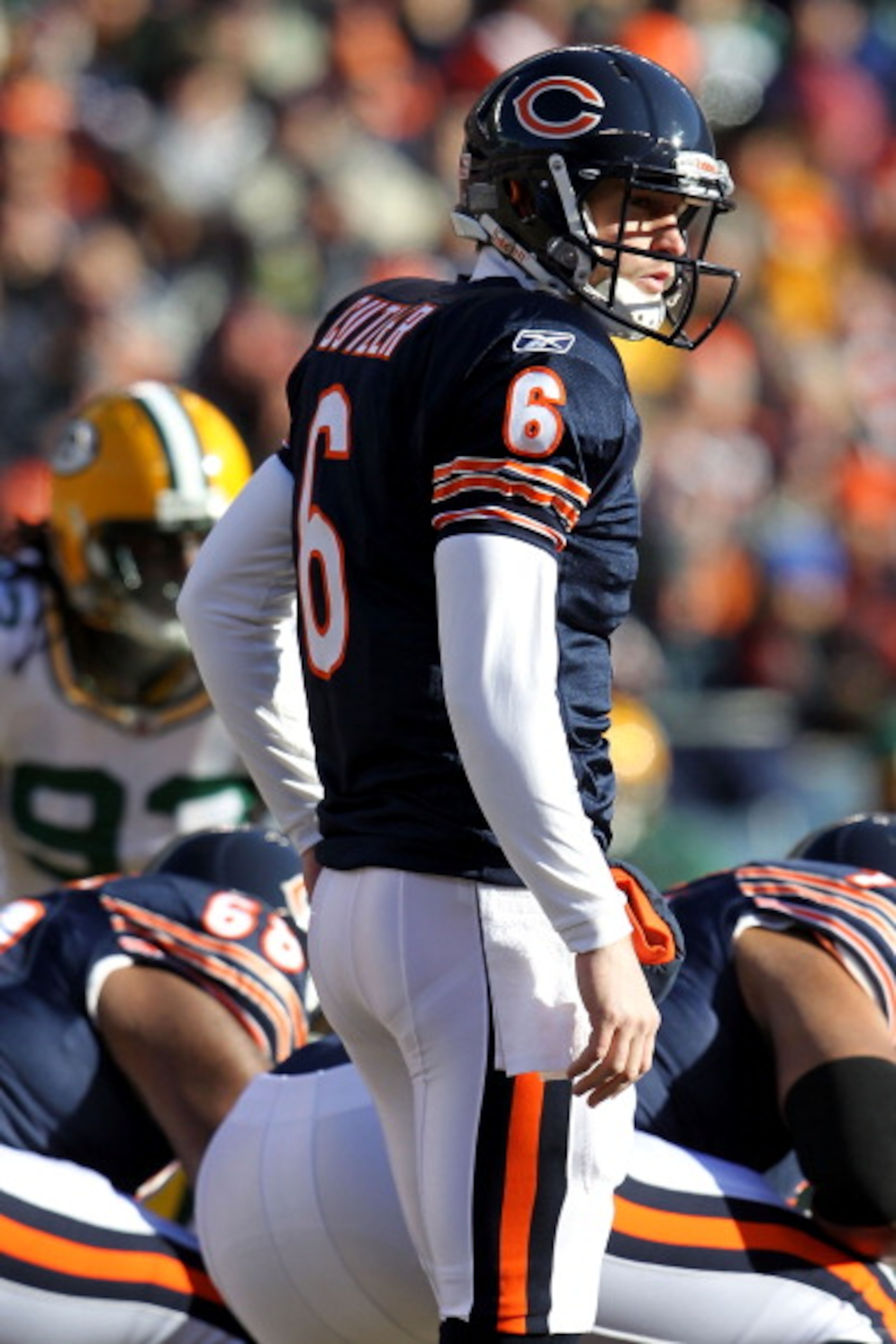 CHICAGO, IL - JANUARY 23:  Quarterback Jay Cutler #6 of the Chicago Bears under center while taking on the Green Bay Packers in the NFC Championship Game at Soldier Field on January 23, 2011 in Chicago, Illinois.  (Photo by Jamie Squire/Getty Images)