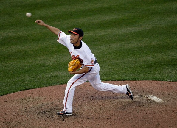BALTIMORE, MD - APRIL 04: Reliever Koji Uehara #19 of the Baltimore Orioles delivers to a Detroit Tigers batter during the ninth inning during opening day at Oriole Park at Camden Yards on April 4, 2011 in Baltimore, Maryland. (Photo by Rob Carr/Getty I