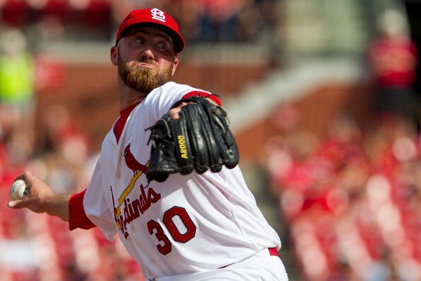 ST. LOUIS, MO - APRIL 6: Reliever Jason Motte #30 of the St. Louis Cardinals pitches against the Pittsburgh Pirates at Busch Stadium on April 6, 2011 in St. Louis, Missouri. (Photo by Dilip Vishwanat/Getty Images)