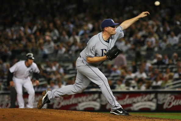 NEW YORK - SEPTEMBER 21:  Jake McGee #57 of the Tampa Bay Rays pitches against the New York Yankees on September 21, 2010 at Yankee Stadium in the Bronx borough of New York City. The Yankees defeated the Rays 8 - 3. (Photo by Andrew Burton/Getty Images)