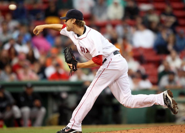 BOSTON - AUGUST 22:  Daniel Bard #51 of the Boston Red Sox delivers a pitch in the seventh inning against the Toronto Blue Jays on August 22, 2010 at Fenway Park in Boston, Massachusetts. The Red Sox defeated the Blue Jay 5-0.  (Photo by Elsa/Getty Images