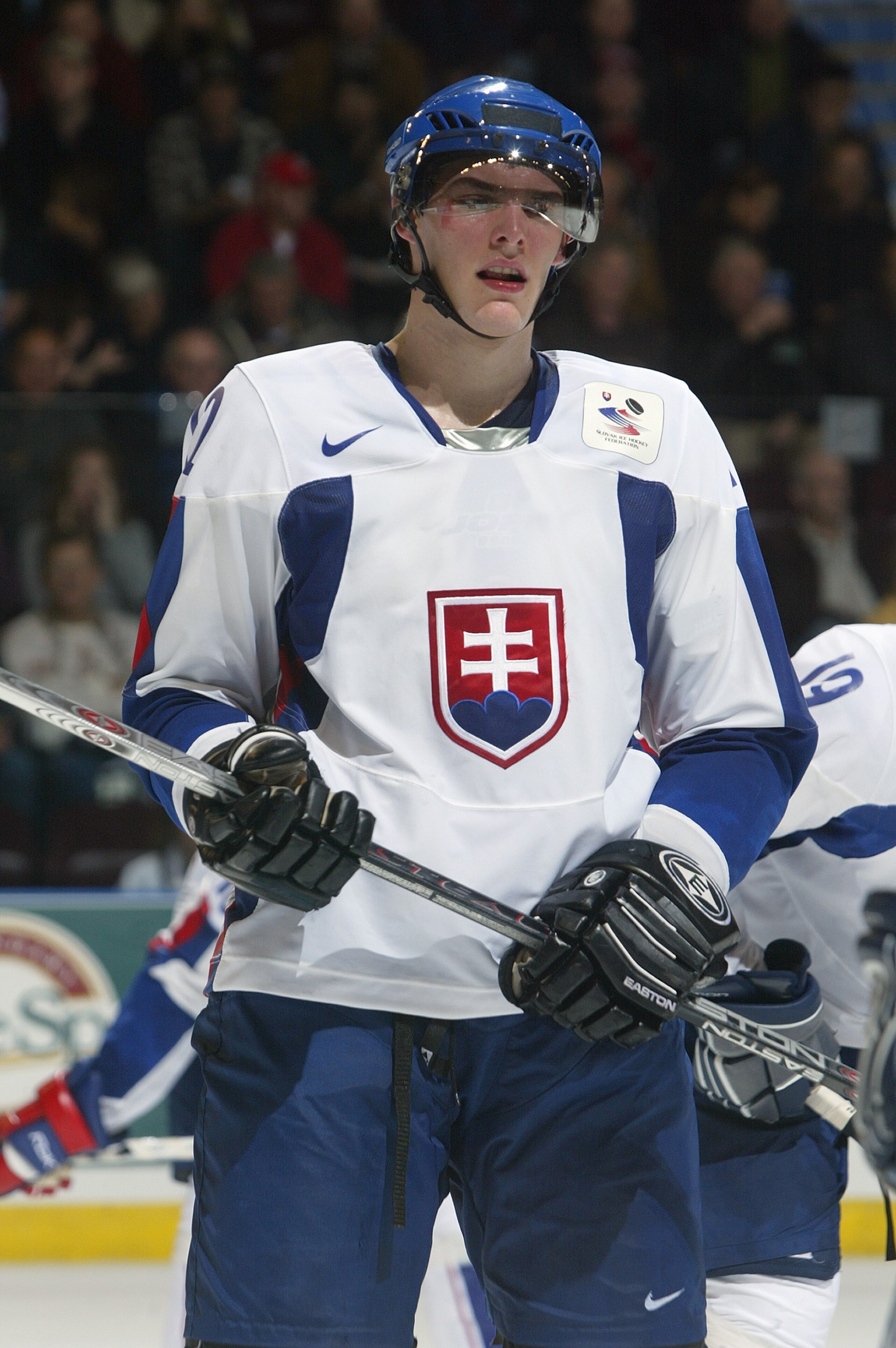 KELOWNA, CANADA - DECEMBER 27:  Juraj Mikus #12 of Team Slovakia skates against Team Latvia during their World Junior Hockey Championship game at Prospera Place on December 27, 2005 in Kelowna, British Columbia, Canada.  Slovakia defeated Latvia 7-4. (Pho