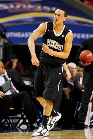ATLANTA, GA - MARCH 11:  John Jenkins #23 of the Vanderbilt Commodores celebrates their win over the Mississippi State Bulldogs during the quarterfinals of the SEC Men's Basketball Tournament at Georgia Dome on March 11, 2011 in Atlanta, Georgia. The Comm