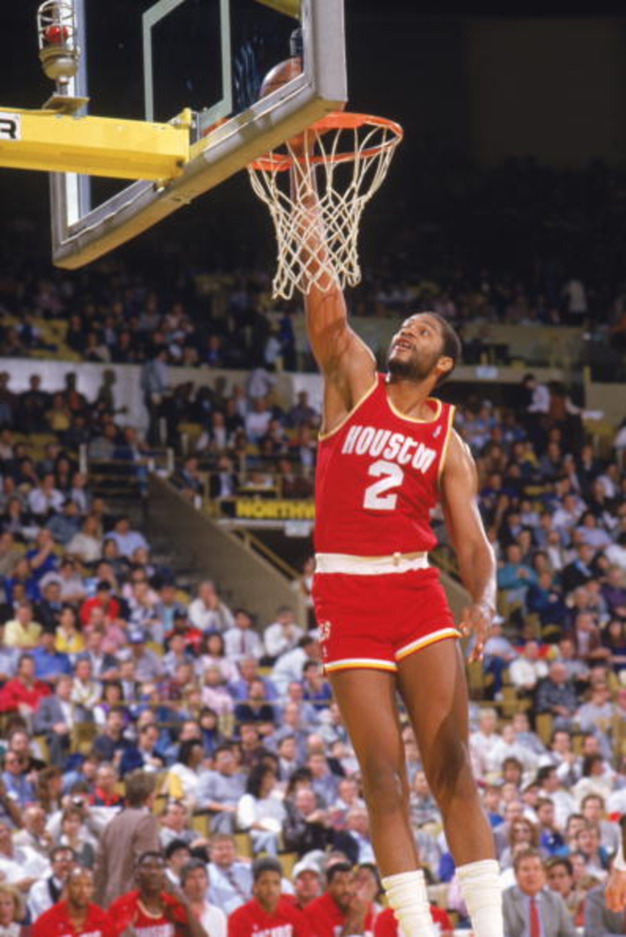 INGLEWOOD -1987: Joe Barry Carroll #2 of the Houston Rockets dunks during a game in the1987-88 season. NOTE TO USER: User expressly acknowledges and agrees that, by downloading and/or using this Photograph, User is consenting to the terms and conditions INGLEWOOD -1987: Joe Barry Carroll #2 of the Houston Rockets dunks during a game in the1987-88 season. NOTE TO USER: User expressly acknowledges and agrees that, by downloading and/or using this Photograph, User is consenting to the terms and conditions