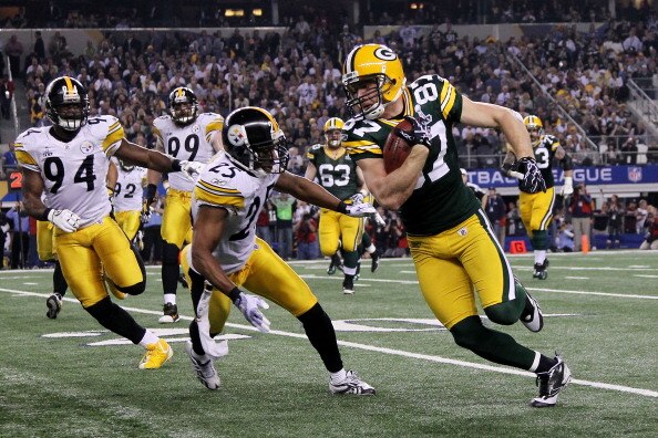 ARLINGTON, TX - FEBRUARY 06:  Jordy Nelson #87 of the Green Bay Packers runs down field against the Pittsburgh Steelers during the third quarter of Super Bowl XLV at Cowboys Stadium on February 6, 2011 in Arlington, Texas.  (Photo by Doug Pensinger/Getty 