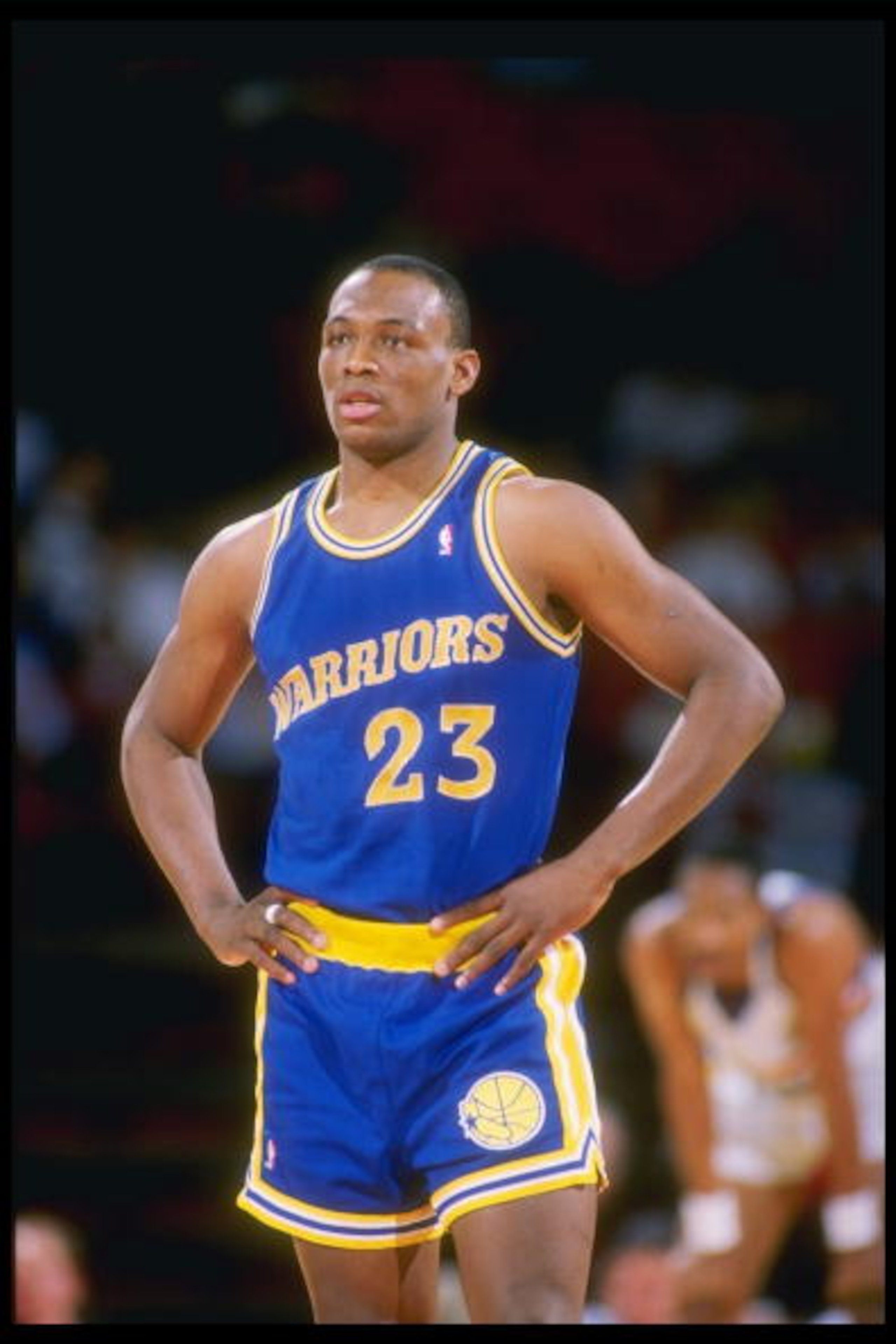 1989-1990: Guard Mitch Richmond of the Golden State Warriors looks on during a basketball game. Mandatory Credit: Tim de Frisco /Allsport 1989-1990: Guard Mitch Richmond of the Golden State Warriors looks on during a basketball game. Mandatory Credit: Tim de Frisco /Allsport
