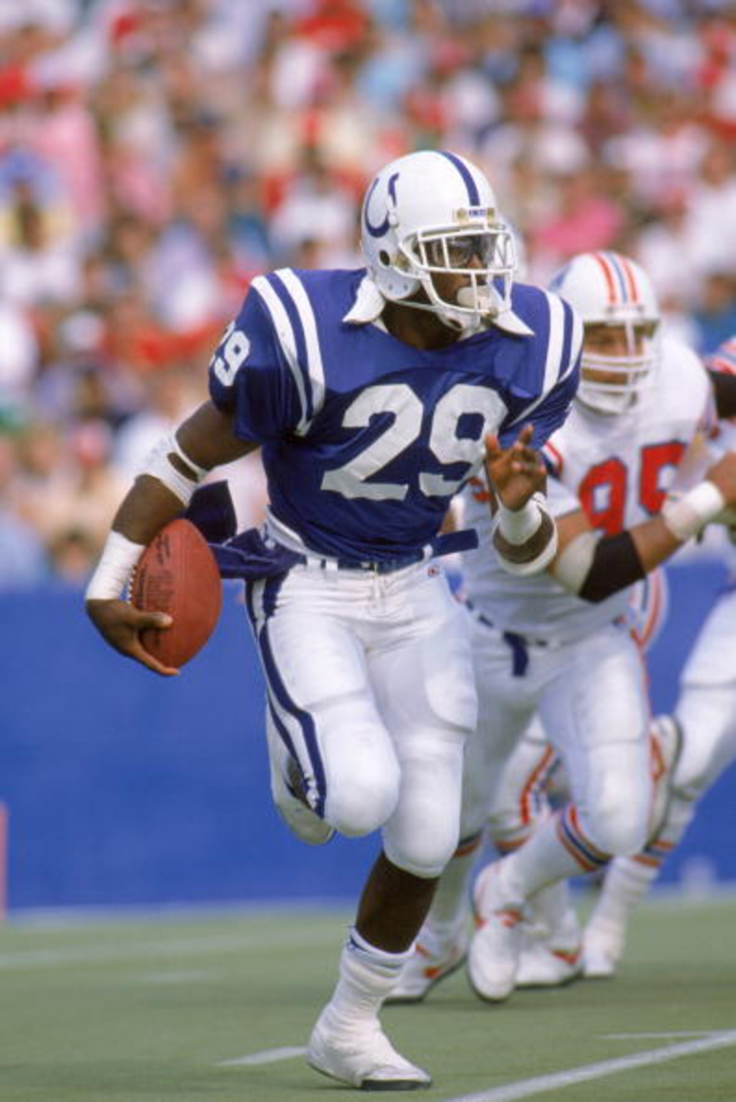 INDIANAPOLIS - OCTOBER 2: Eric Dickerson #29 of the Indianapolis Colts carries the ball up the field during a 1988 season game against the New England Patriots. The Patriots won 21-17. (Photo by: Rick Stewart/Getty Images)