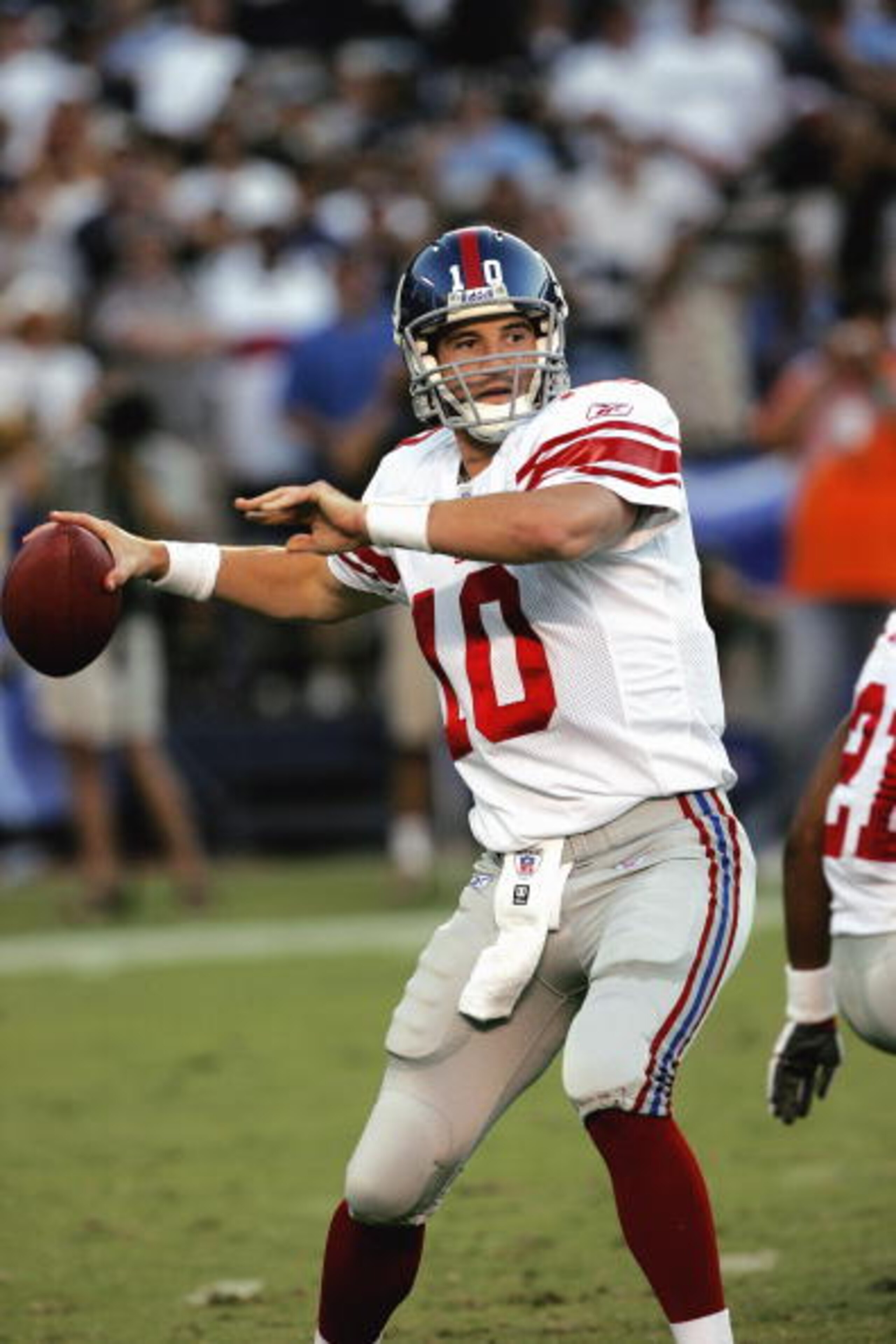 SAN DIEGO - SEPTEMBER 25:  Eli Manning #10 of the New York Giants drops back to pass against the San Diego Chargers on September 25, 2005 at Qualcomm Stadium in San Diego, California.  The Chargers won 45-23.  (Photo by Stephen Dunn /Getty Images)