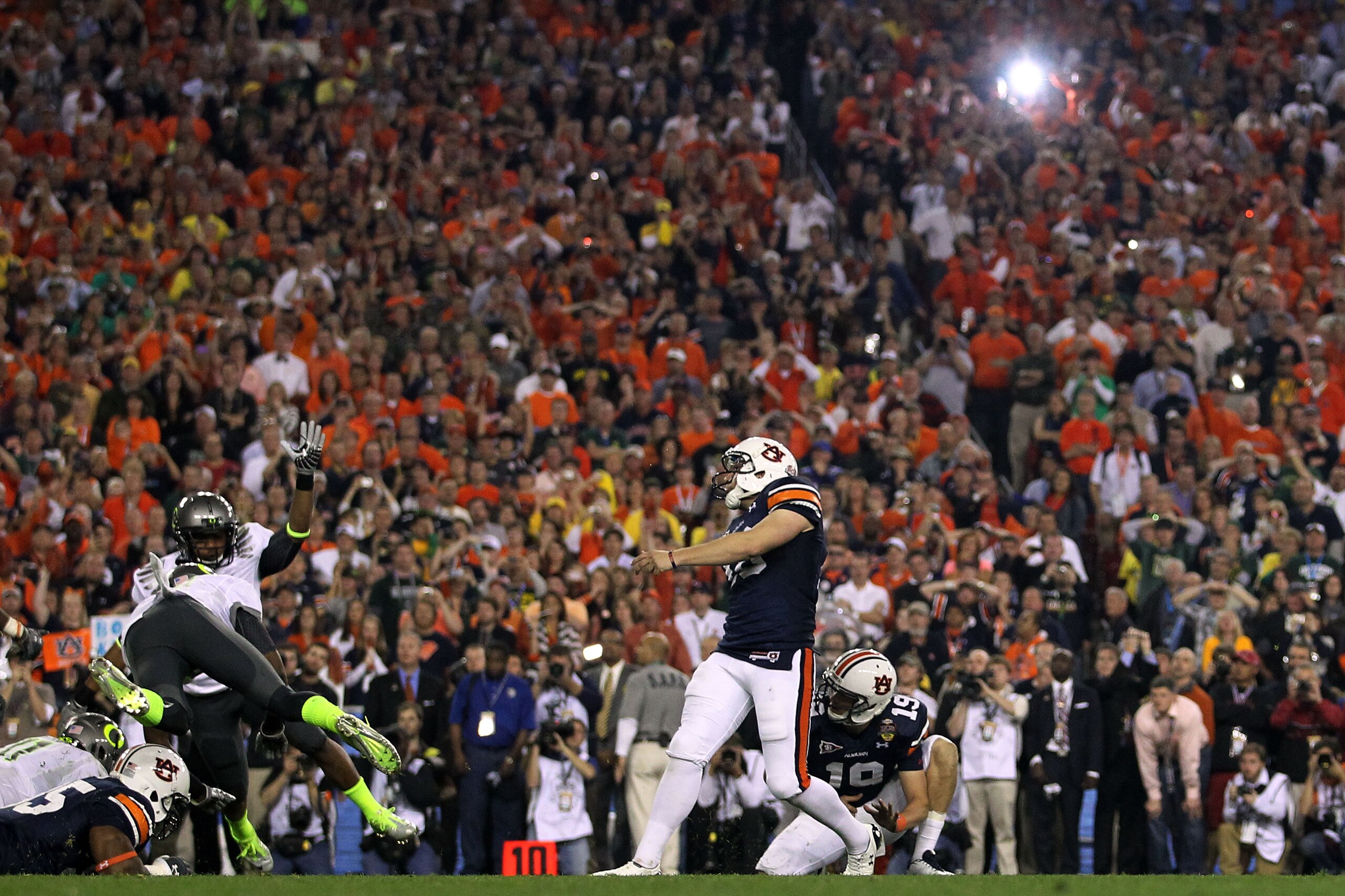 GLENDALE, AZ - JANUARY 10:  Kicker Wes Byrum #18 of the Auburn Tigers kicks a 19-yard game-winning field goal to defeat the Oregon Ducks 22-19 in the Tostitos BCS National Championship Game at University of Phoenix Stadium on January 10, 2011 in Glendale,