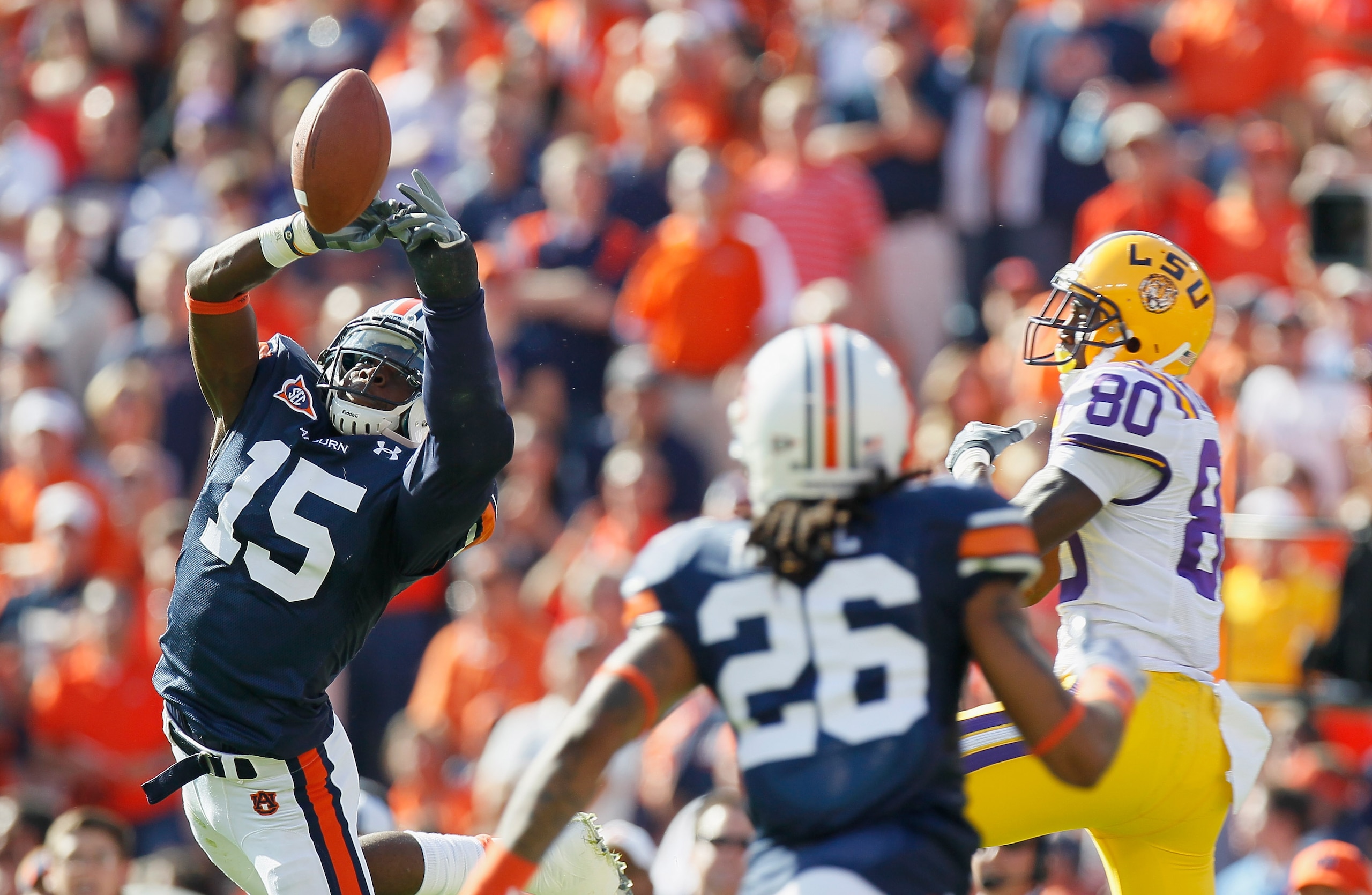 AUBURN, AL - OCTOBER 23:  Neiko Thorpe #15 of the Auburn Tigers intercepts a pass intended for Terrence Toliver #80 of the LSU Tigers at Jordan-Hare Stadium on October 23, 2010 in Auburn, Alabama.  (Photo by Kevin C. Cox/Getty Images)