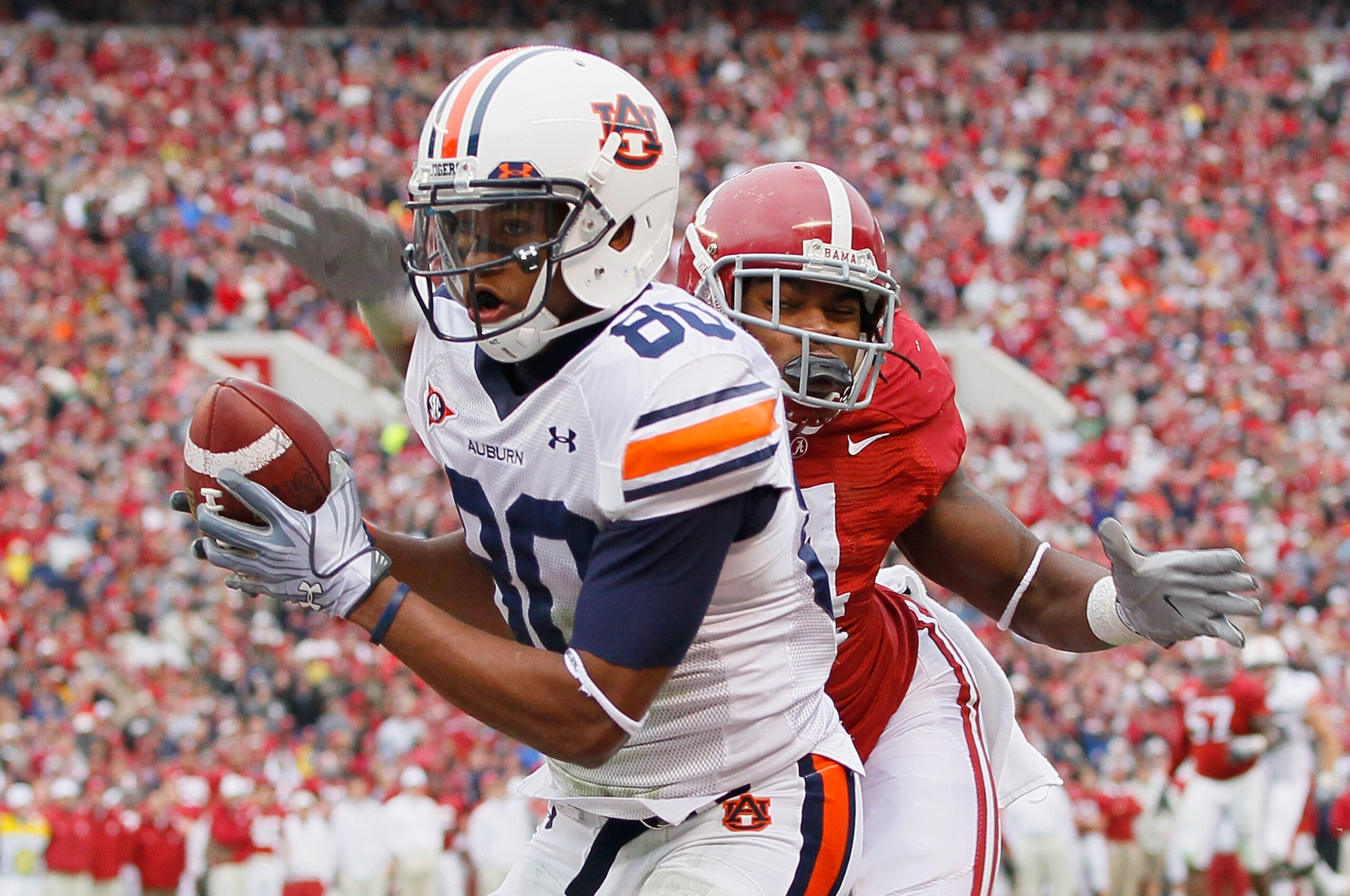 TUSCALOOSA, AL - NOVEMBER 26:  Emory Blake #80 of the Auburn Tigers pulls in this touchdown against Mark Barron #4 of the Alabama Crimson Tide at Bryant-Denny Stadium on November 26, 2010 in Tuscaloosa, Alabama.  (Photo by Kevin C. Cox/Getty Images)