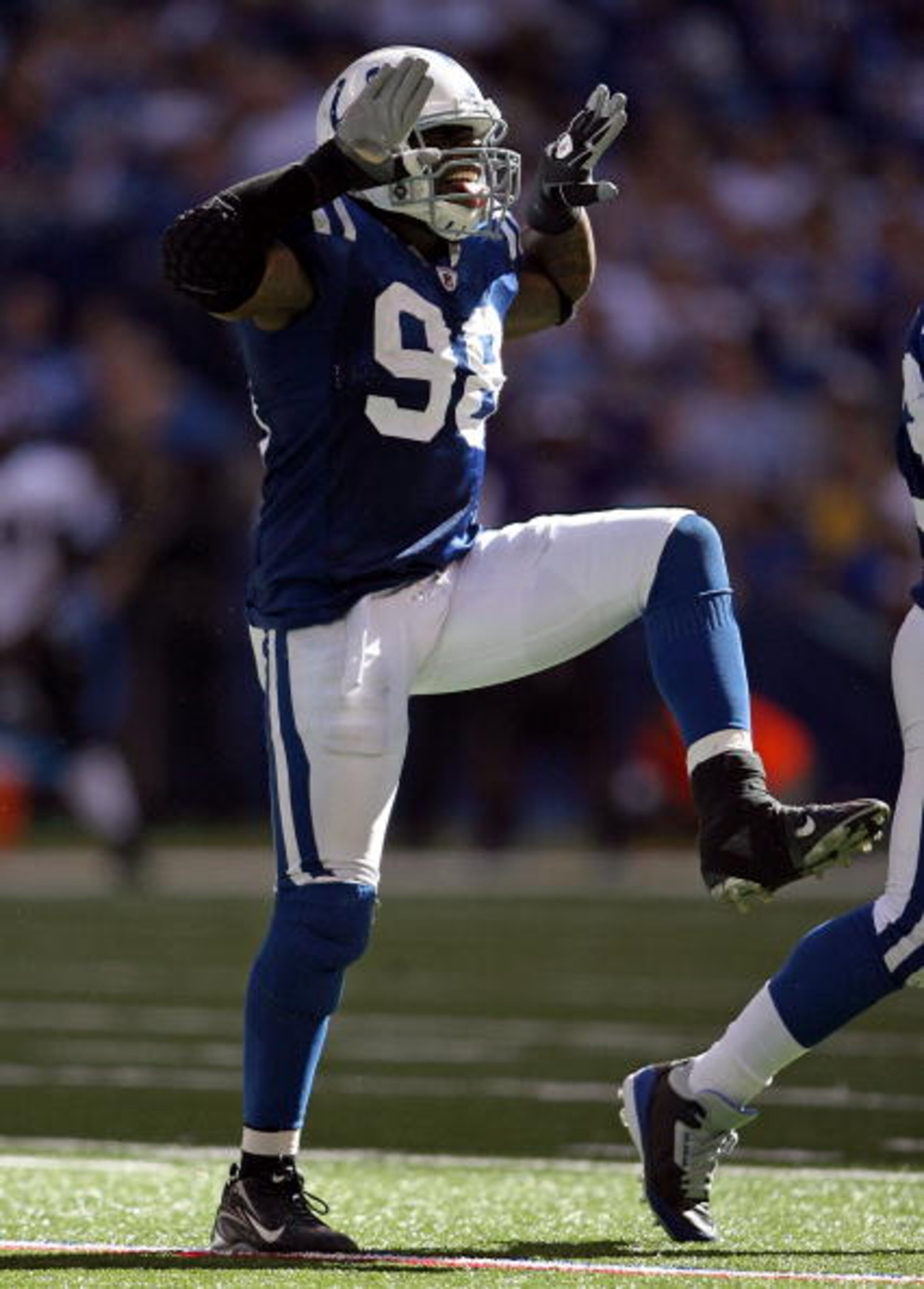 INDIANAPOLIS - OCTOBER 12:  Robert Mathis #98 of the Indianapolis Colts celebrates during the NFL game against the Baltimore Ravens at Lucas Oil Stadium on October 12, 2008 in Indianapolis, Indiana.  (Photo by Andy Lyons/Getty Images)
