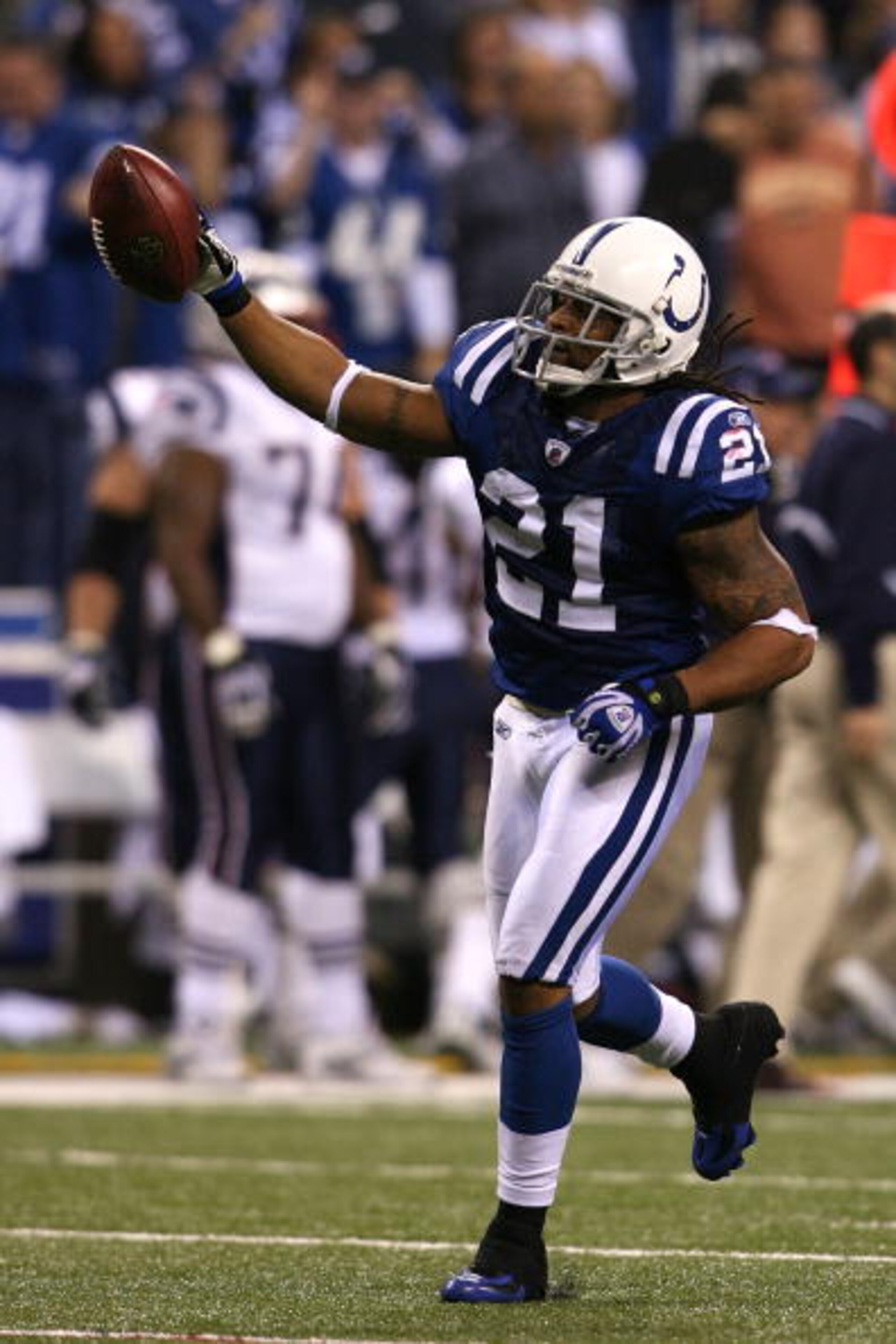 INDIANAPOLIS - NOVEMBER 02:  Bob Sanders #21 of the Indianapolis Colts celebrates after he intercepted  a pass in the fourth quarter against the New England Patriots at Lucas Oil Stadium on November 2, 2008 in Indianapolis, Indiana.  (Photo by Andy Lyons/