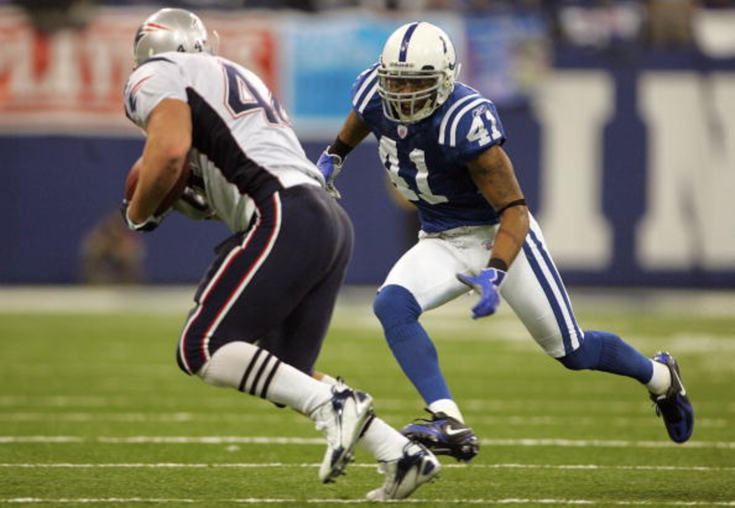 INDIANAPOLIS - JANUARY 21:  Antonie Bethea #41 of the Indianapolis Colts tries to tackle Heath Evans #44 of the New England Patriots during the AFC Championship Game on January 21, 2007 at the RCA Dome in Indianapolis, Indiana.  (Photo by Doug Pensinger/G