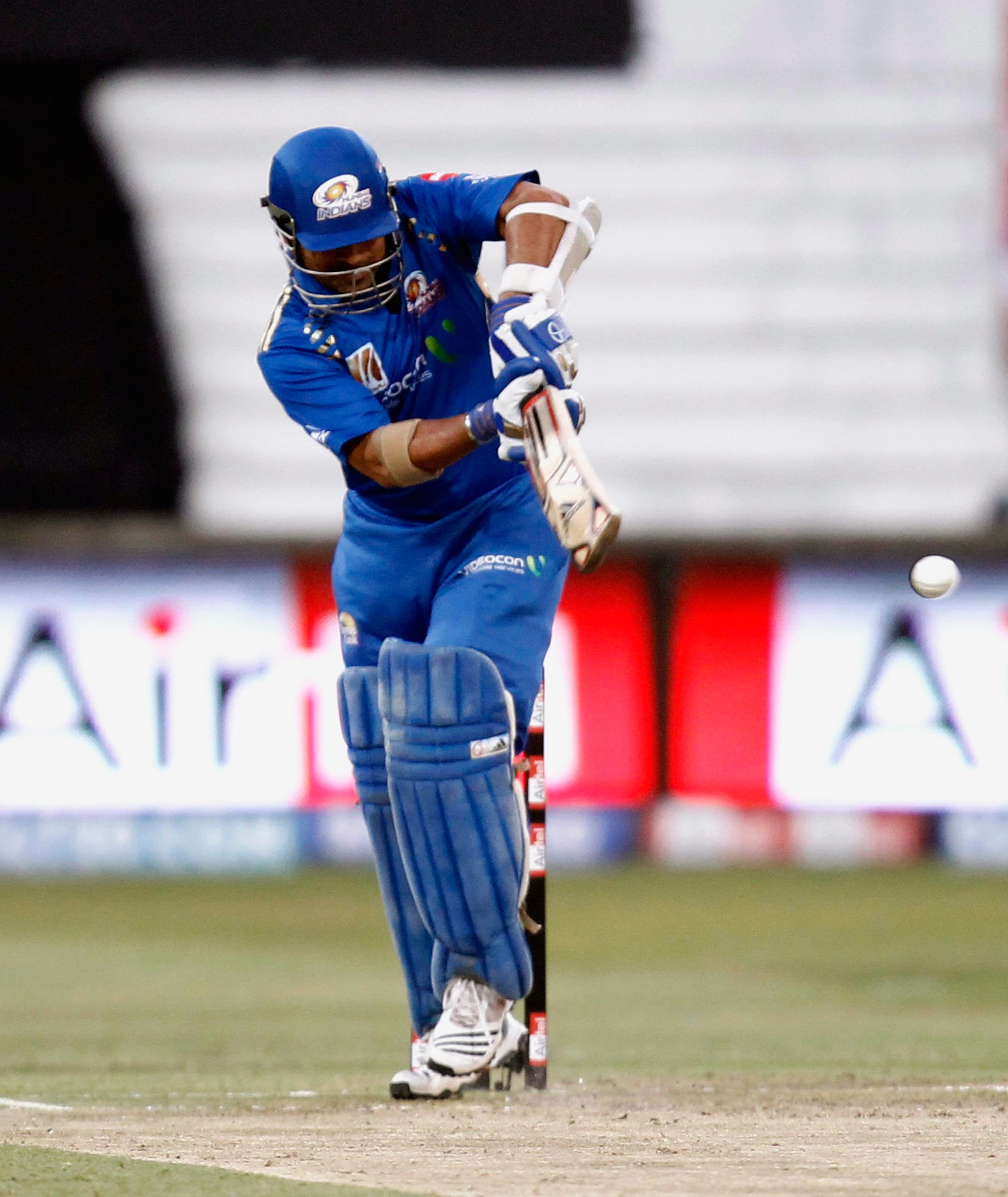 DURBAN, SOUTH AFRICA - SEPTEMBER 19: Sachin Tendulkar of the Mumbai Indians of hits out during the Airtel Champions League Twenty20 match between Mumbai Indians and Royal Challengers Bangalore at Sahara Stadium Kingsmead on September 19, 2010 in Durban, S DURBAN, SOUTH AFRICA - SEPTEMBER 19: Sachin Tendulkar of the Mumbai Indians of hits out during the Airtel Champions League Twenty20 match between Mumbai Indians and Royal Challengers Bangalore at Sahara Stadium Kingsmead on September 19, 2010 in Durban, S