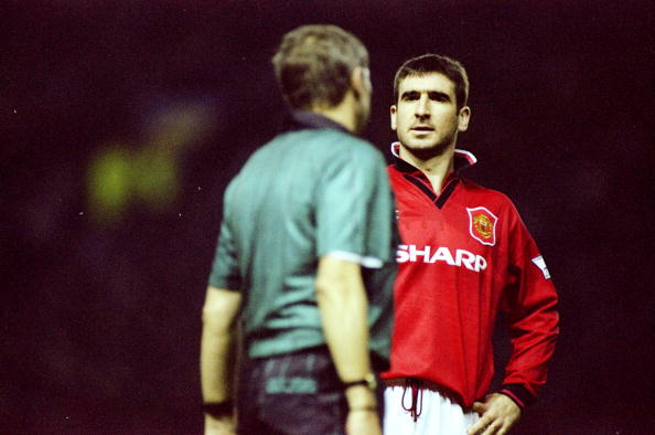 17 Dec 1994:  Eric Cantona of Manchester United talks to the referee during an FA Carling Premiership match against Nottingham Forest at Old Trafford in Manchester, England. Nottingham Forest won the match 2-1. \ Mandatory Credit: Anton  Want/Allsport
