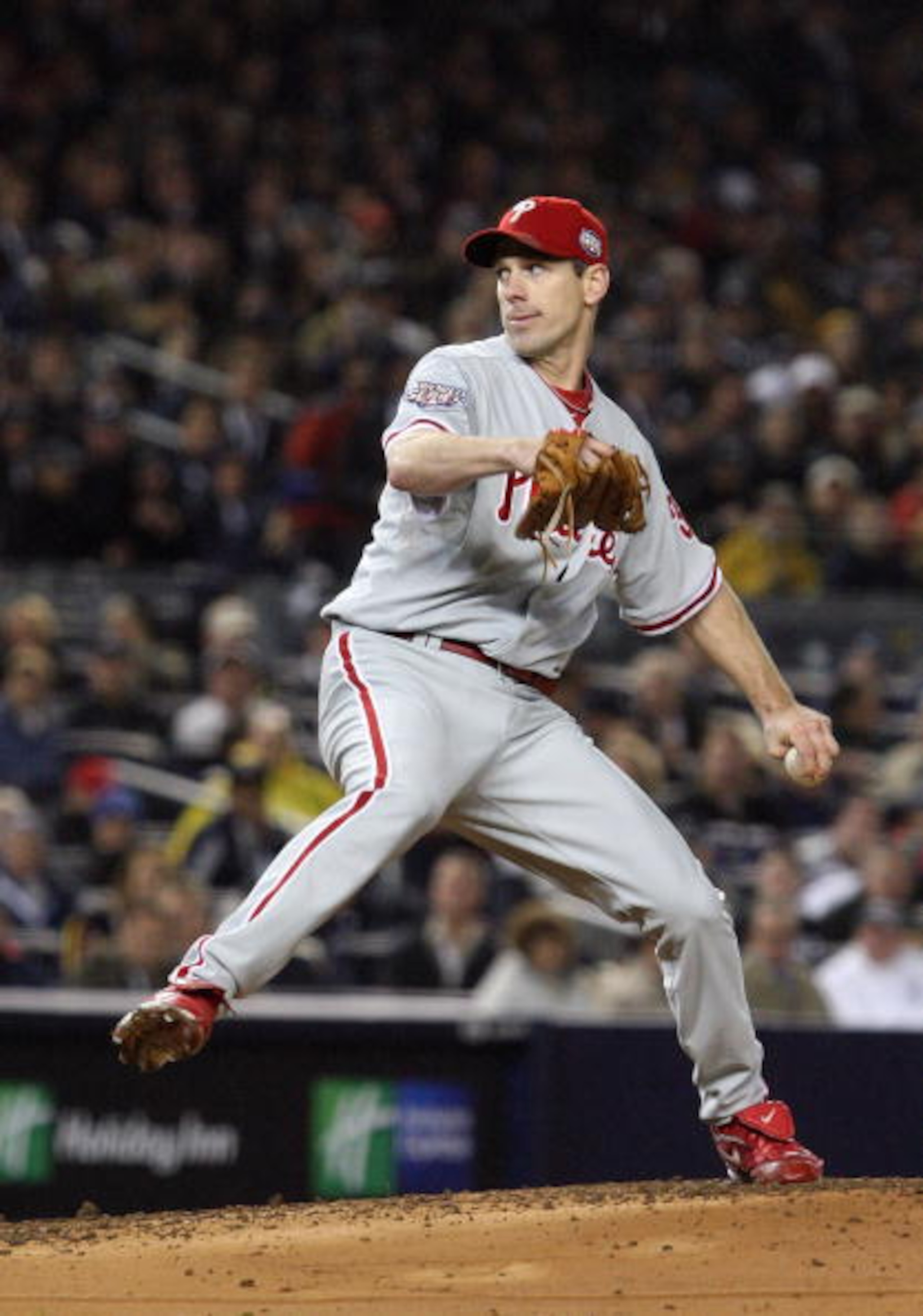 NEW YORK - OCTOBER 28:  Cliff Lee #34 of the Philadelphia Phillies throws a pitch against the New York Yankees in Game One of the 2009 MLB World Series at Yankee Stadium on October 28, 2009 in the Bronx borough of New York City. The Phillies won 6-1.  (Ph
