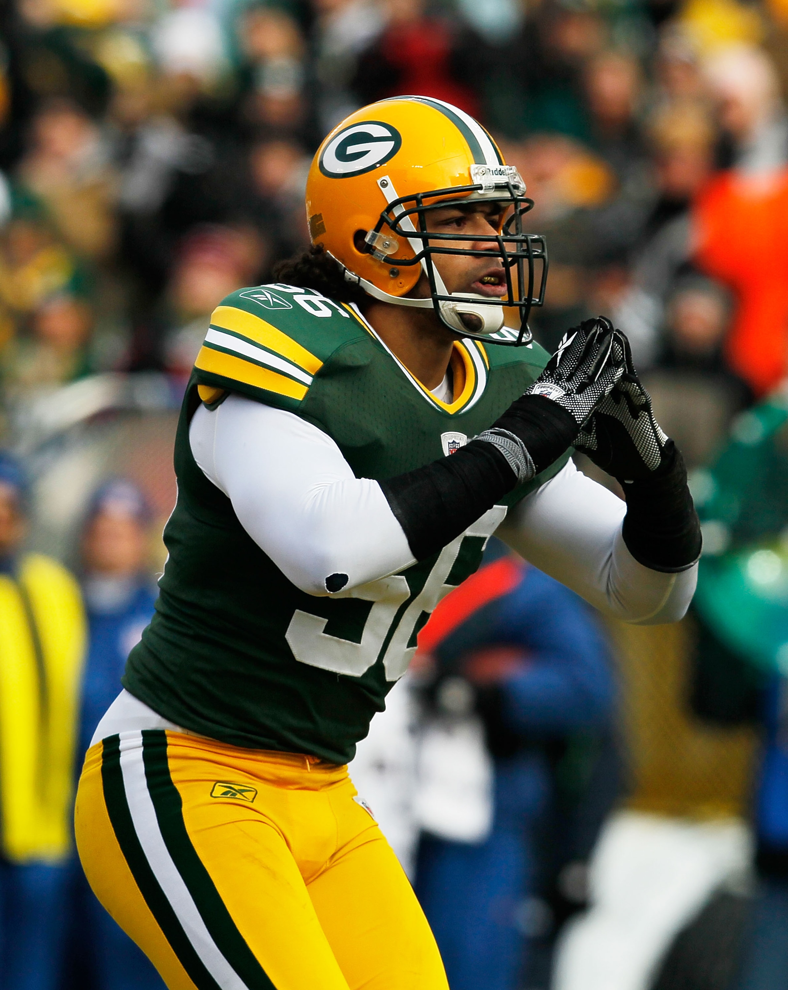 GREEN BAY, WI - DECEMBER 27: Nick Barnett #56 of the Green Bay Packers takes a bow for the fans after sacking Matt Hasselbeck of the Seattle Seahawks at Lambeau Field on December 27, 2009 in Green Bay, Wisconsin. The Packers defeated the Seahawks 48-10. ( GREEN BAY, WI - DECEMBER 27: Nick Barnett #56 of the Green Bay Packers takes a bow for the fans after sacking Matt Hasselbeck of the Seattle Seahawks at Lambeau Field on December 27, 2009 in Green Bay, Wisconsin. The Packers defeated the Seahawks 48-10. (