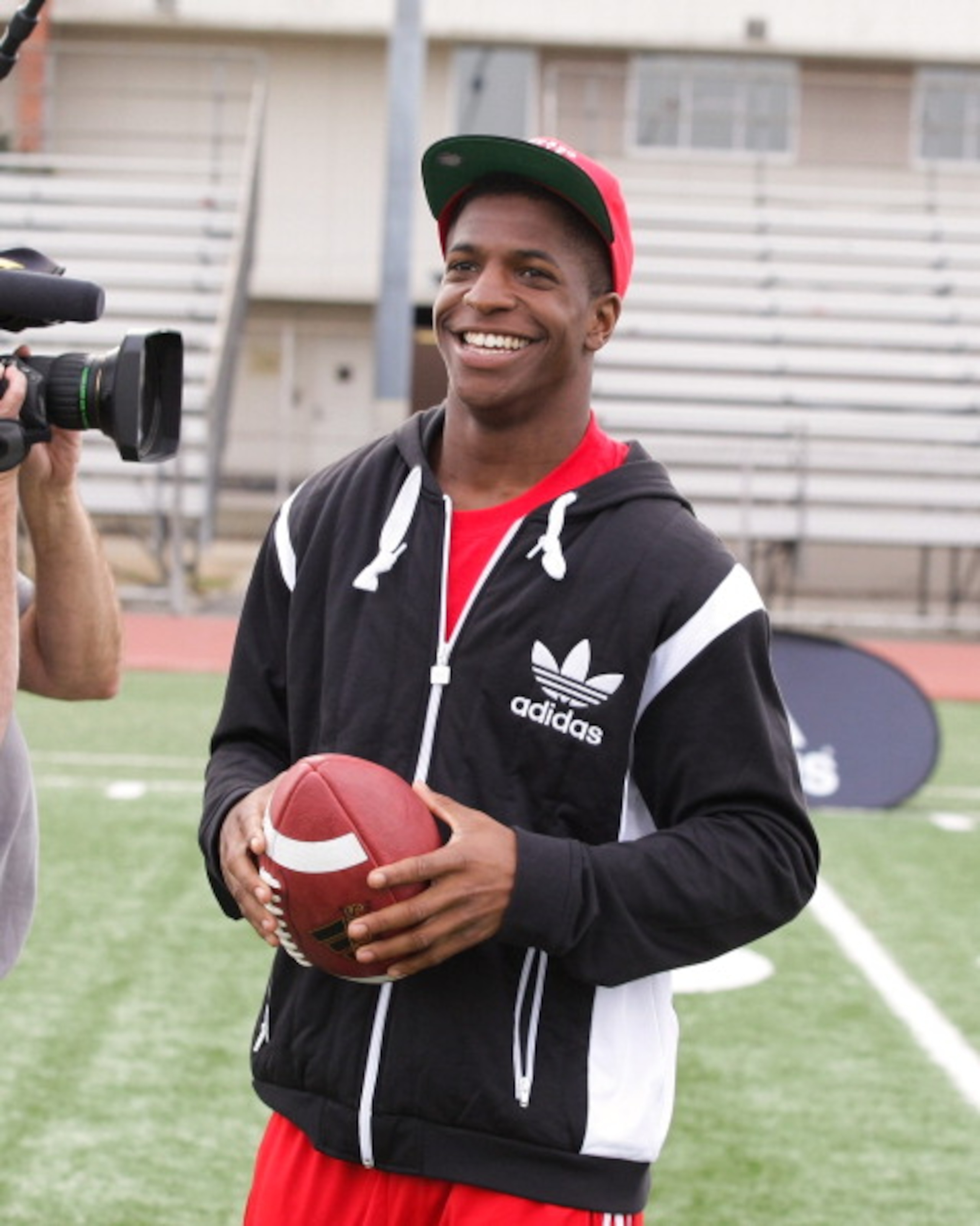 LOS ANGELES, CA - MARCH 19:  adidas and Titus Young pop into a football practice in Los Angeles to capture game faces as part of the adidas Facebook Game Face contest.  (Photo by Noel Vasquez/Getty Images for adidas)