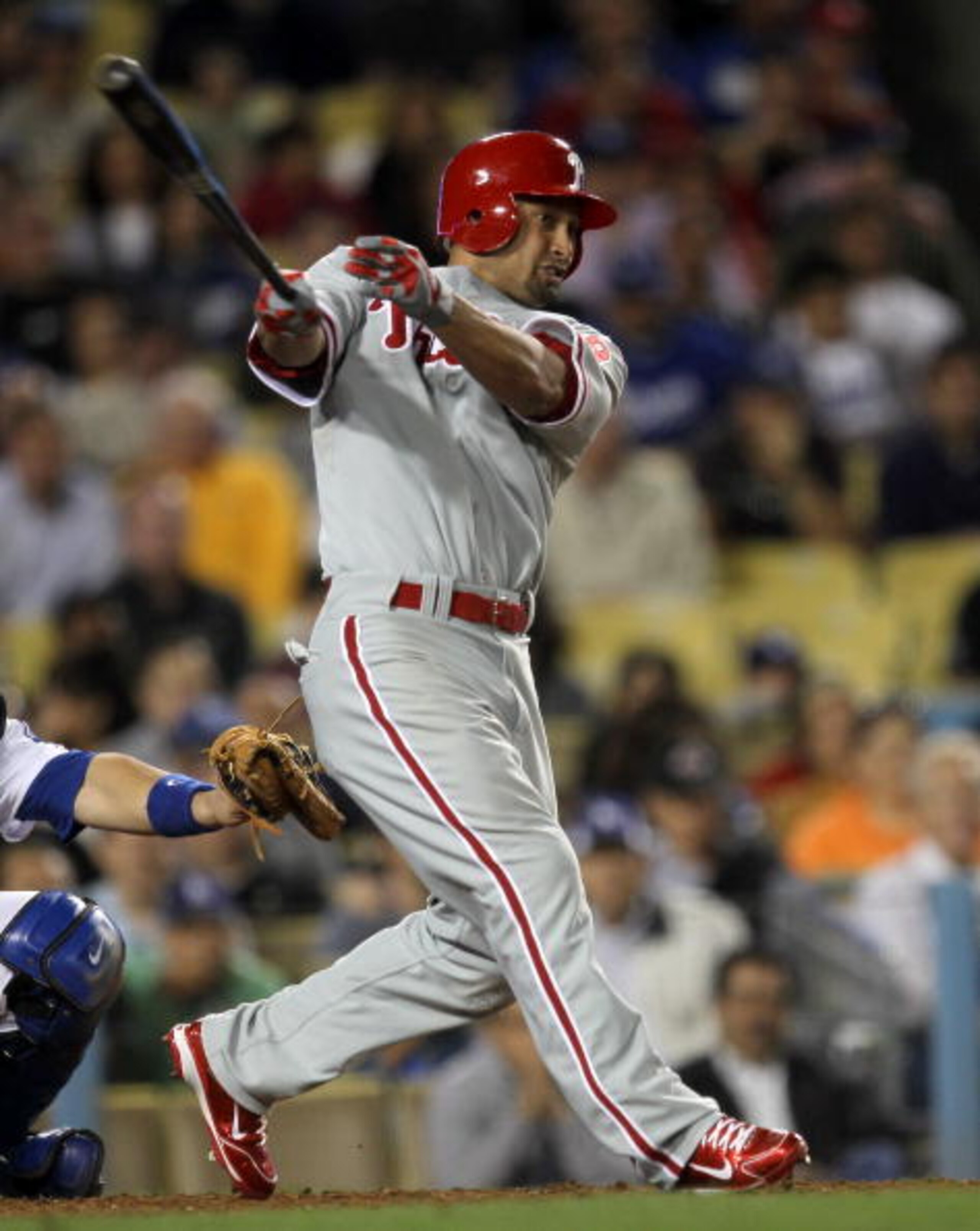 LOS ANGELES - AUGUST 30: Shane Victorino #8 of the Philadelphia Phillies gets a single to break up a no hitter by pitcher Hiroki Kuroda #18 in the eighth inning against the Los Angeles Dodgers on August 30, 2010 at Dodger Stadium  in Los Angeles, Californ