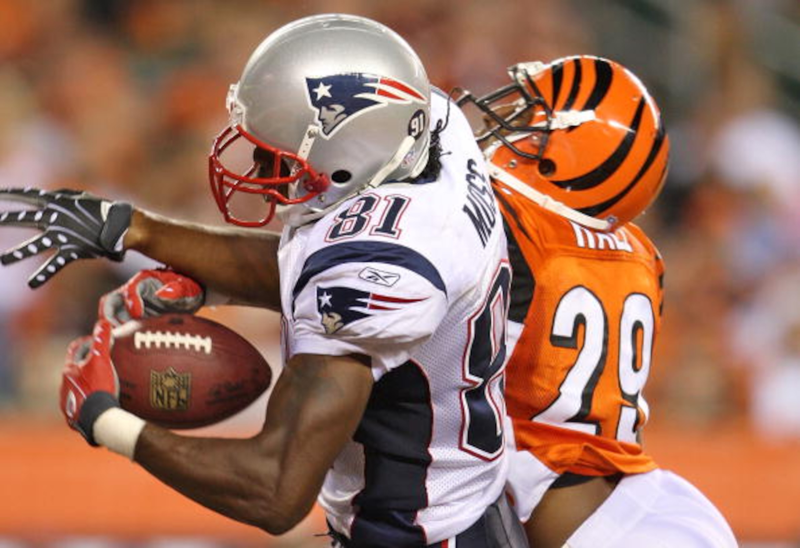 CINCINNATI - OCTOBER 01: Randy Moss #81 of the New England Patriots catches a touchdown pass while defended by Leon Hall #29 of the Cincinnati Bengals during the NFL game on October 1, 2007 at Paul Brown Stadium in Cincinnati, Ohio. (Photo by Andy Lyons CINCINNATI - OCTOBER 01: Randy Moss #81 of the New England Patriots catches a touchdown pass while defended by Leon Hall #29 of the Cincinnati Bengals during the NFL game on October 1, 2007 at Paul Brown Stadium in Cincinnati, Ohio. (Photo by Andy Lyons