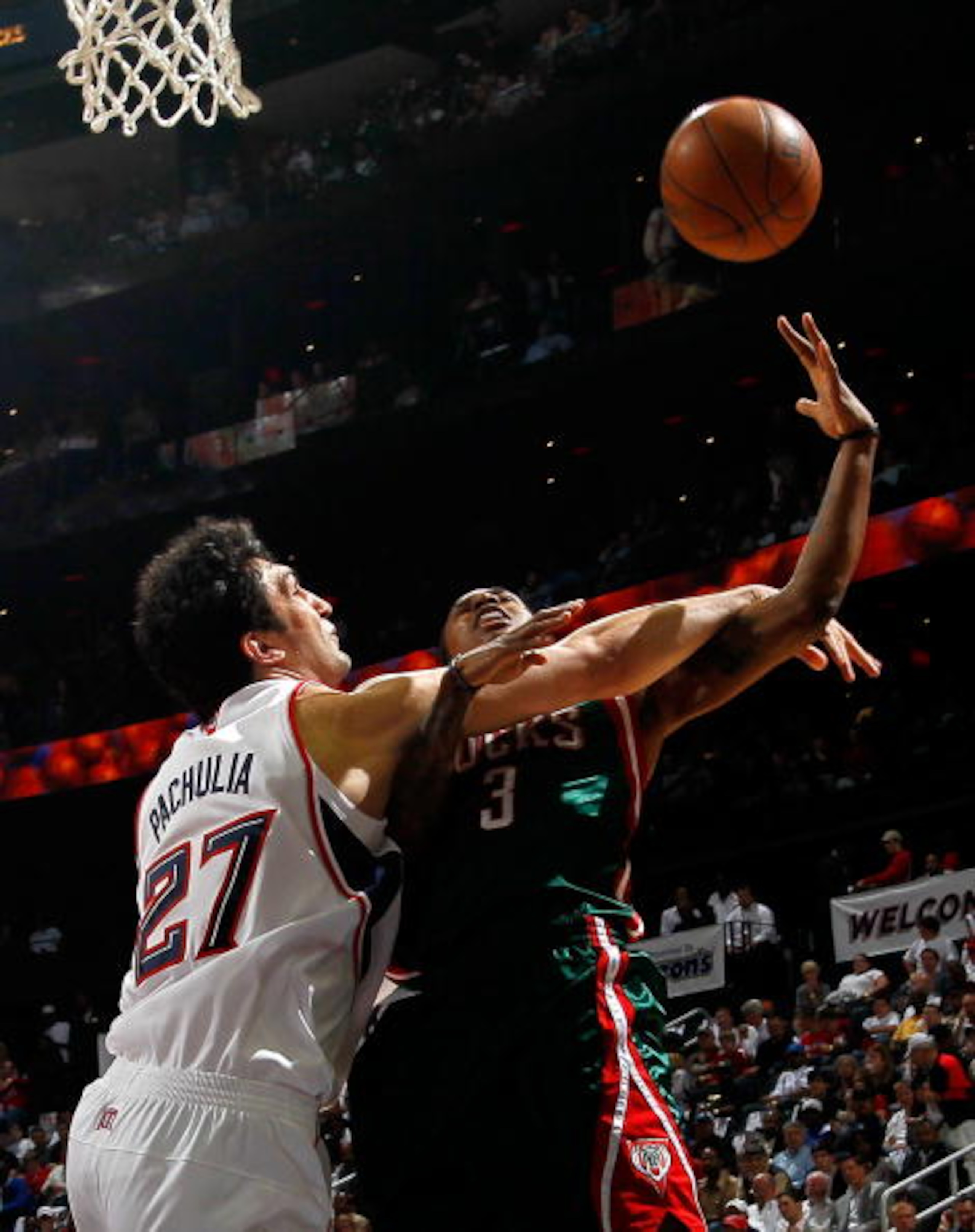 ATLANTA - APRIL 28: Brandon Jennings #3 of the Milwaukee Bucks is fouled hard by Zaza Pachulia #27 of the Atlanta Hawks during Game Five of the Eastern Conference Quarterfinals of the 2010 NBA Playoffs at Philips Arena on April 28, 2010 in Atlanta, Georg ATLANTA - APRIL 28: Brandon Jennings #3 of the Milwaukee Bucks is fouled hard by Zaza Pachulia #27 of the Atlanta Hawks during Game Five of the Eastern Conference Quarterfinals of the 2010 NBA Playoffs at Philips Arena on April 28, 2010 in Atlanta, Georg