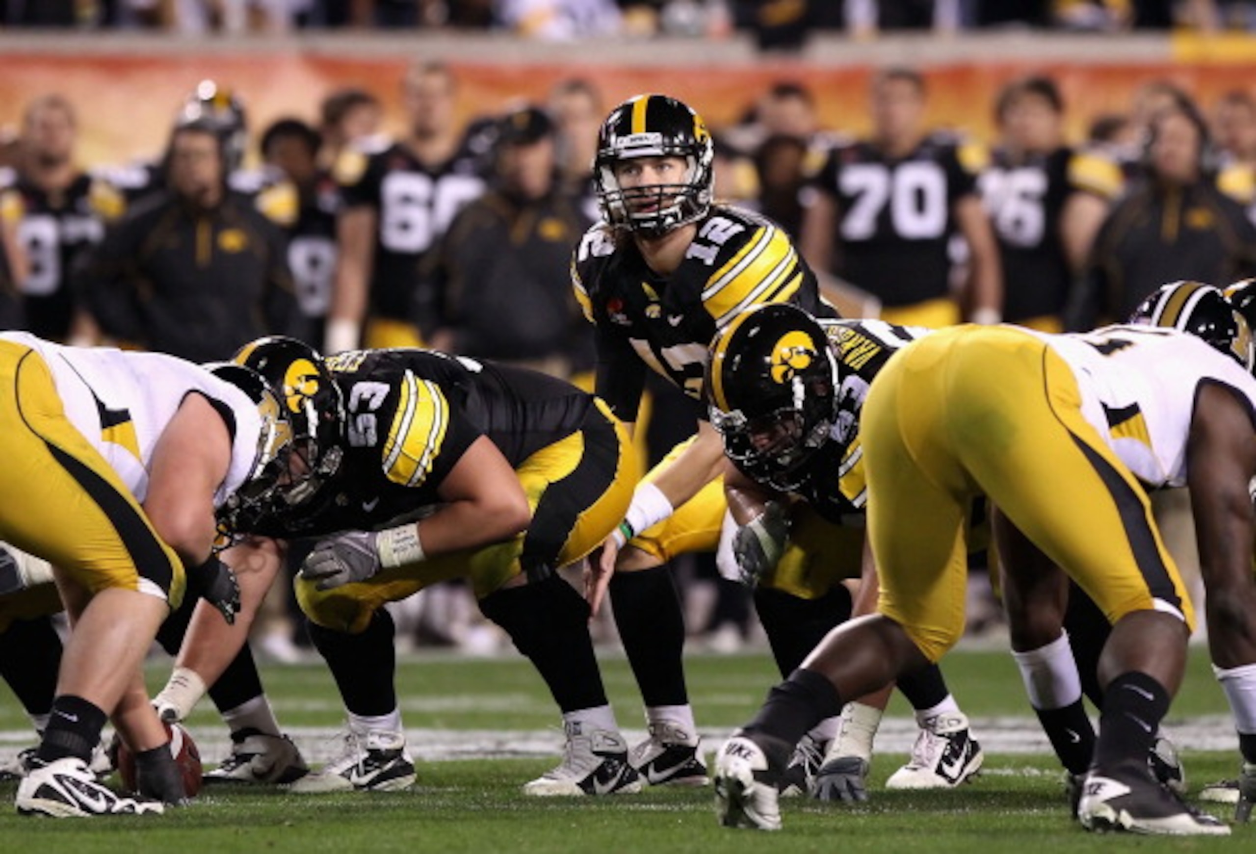 TEMPE, AZ - DECEMBER 28:  Quarterback Ricky Stanzi #12 of the Iowa Hawkeyes prepares to snap the ball during the Insight Bowl against the Missouri Tigers at Sun Devil Stadium on December 28, 2010 in Tempe, Arizona.  The Hawkeyes defeated the Tigers 27-24.