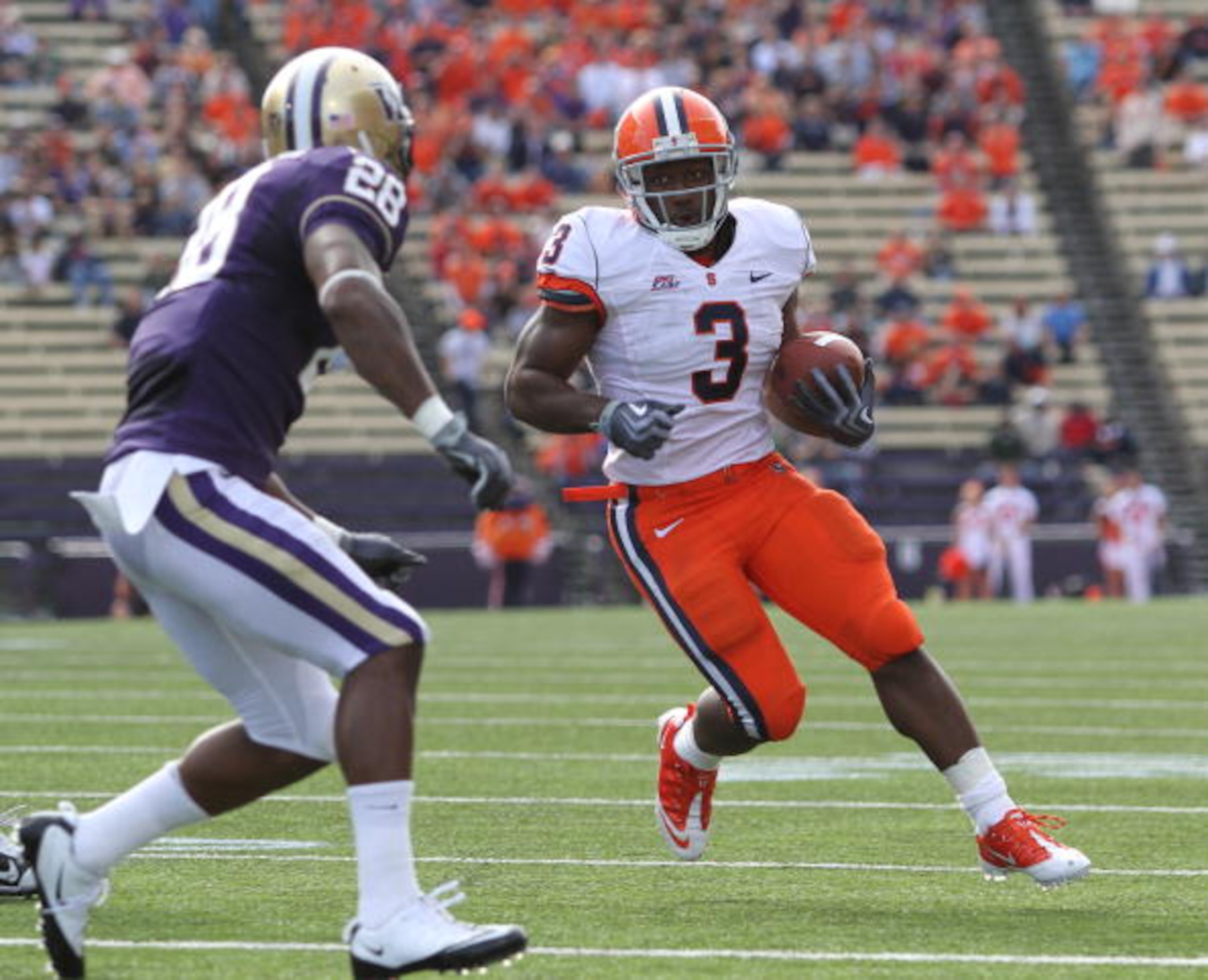 SEATTLE - SEPTEMBER 11:  Running back Delone Carter #3 of the Syracuse Orange rushes against Quinton Richardson #28 of the Washington Huskies on September 11, 2010 at Husky Stadium in Seattle, Washington. (Photo by Otto Greule Jr/Getty Images)