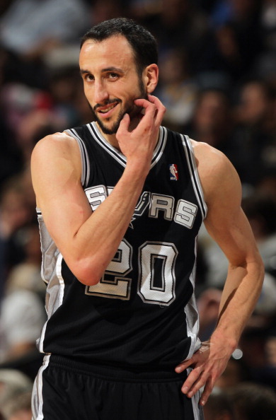 DENVER, CO - MARCH 23:  Manu Ginobili #20 of the San Antonio Spurs looks on during a break in the against the Denver Nuggets at the Pepsi Center on March 23, 2011 in Denver, Colorado. The Nuggets defeated the Spurs 115-112. NOTE TO USER: User expressly ac