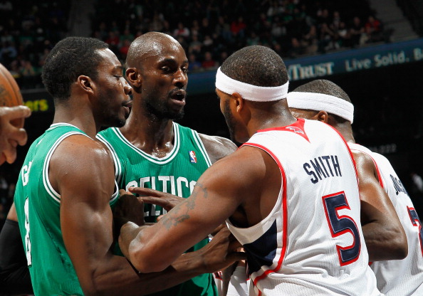 ATLANTA, GA - APRIL 01:  Jeff Green #8 and Kevin Garnett #5 of the Boston Celtics against Josh Smith #5 and Joe Johnson #2 of the Atlanta Hawks at Philips Arena on April 1, 2011 in Atlanta, Georgia.  NOTE TO USER: User expressly acknowledges and agrees th