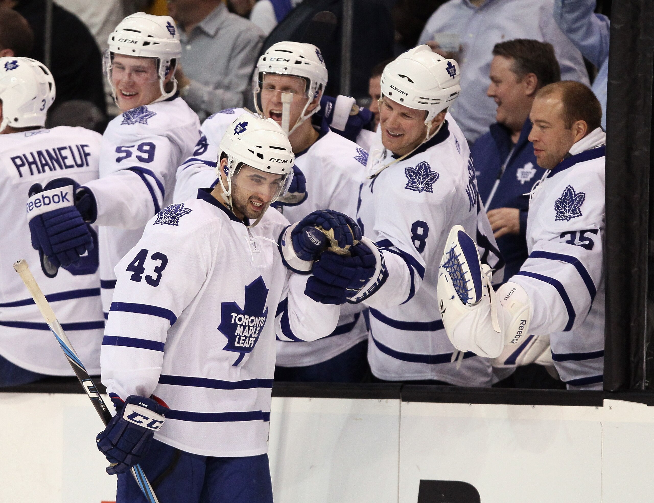 BOSTON, MA - MARCH 31: Nazem Kadri #43 of the Toronto Maple Leafs is congratulated by teammtes on the bench after he scored the game winner in the overtime shootout against the Boston Bruins on March 31, 2011 at the TD Garden in Boston, Massachusetts. Th BOSTON, MA - MARCH 31: Nazem Kadri #43 of the Toronto Maple Leafs is congratulated by teammtes on the bench after he scored the game winner in the overtime shootout against the Boston Bruins on March 31, 2011 at the TD Garden in Boston, Massachusetts. Th