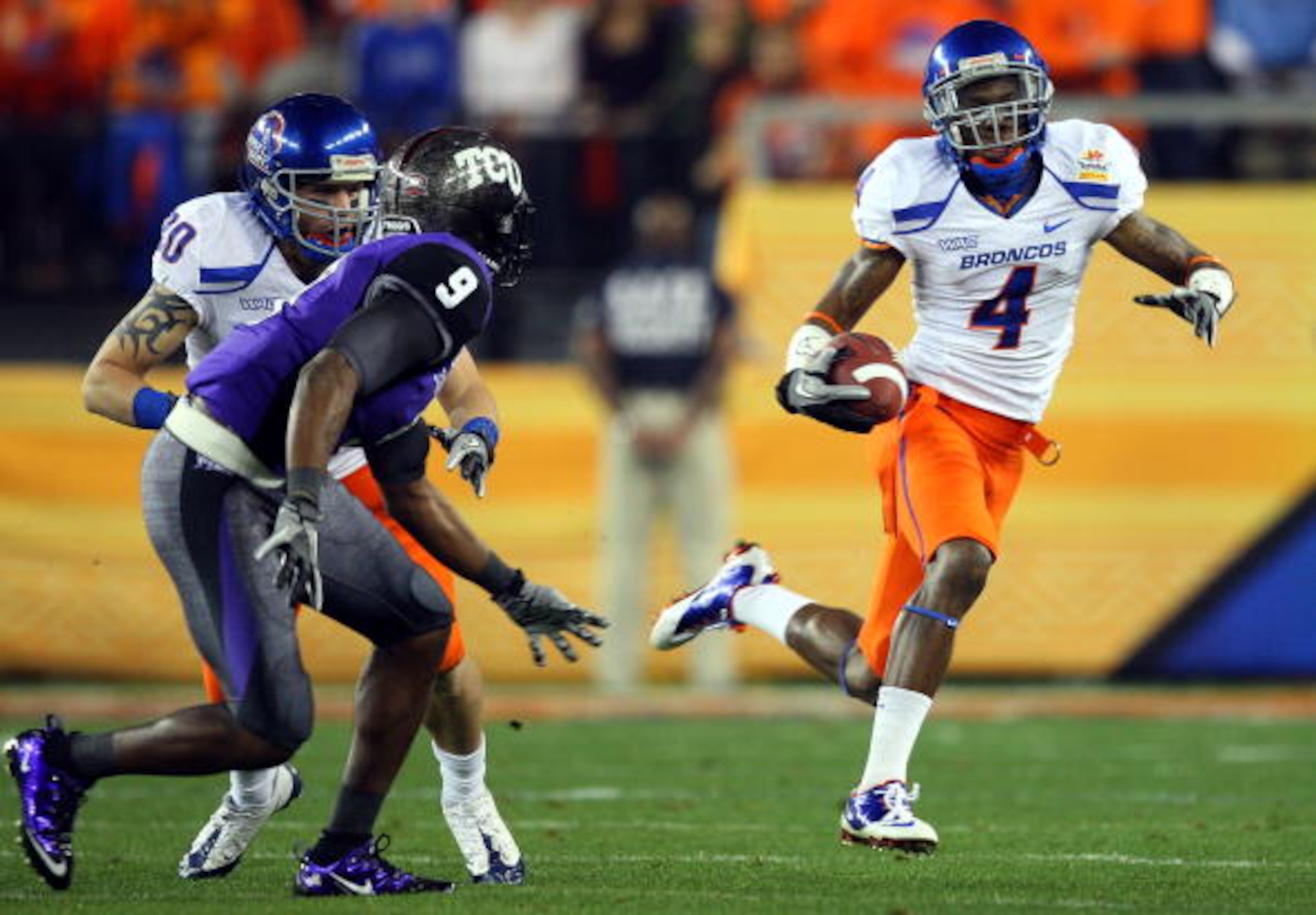 GLENDALE, AZ - JANUARY 04: Titus Young #4 of the Boise State Broncos runs after a catch against the TCU Horned Frogs in the first half during the Tostitos Fiesta Bowl at the Universtity of Phoenix Stadium on January 4, 2010 in Glendale, Arizona. (Photo GLENDALE, AZ - JANUARY 04: Titus Young #4 of the Boise State Broncos runs after a catch against the TCU Horned Frogs in the first half during the Tostitos Fiesta Bowl at the Universtity of Phoenix Stadium on January 4, 2010 in Glendale, Arizona. (Photo