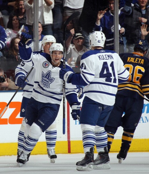 TORONTO, ON - NOVEMBER 06: Clarke MacArthur #16 of the Toronto Maple Leafs celebrtaes a goal by Nikolai Kulemin #41 against the Buffalo Sabres at the Air Canada Centre on November 6, 2010 in Toronto, Canada. The Sabres defeated the Maple Leafs 3-2.  (Phot