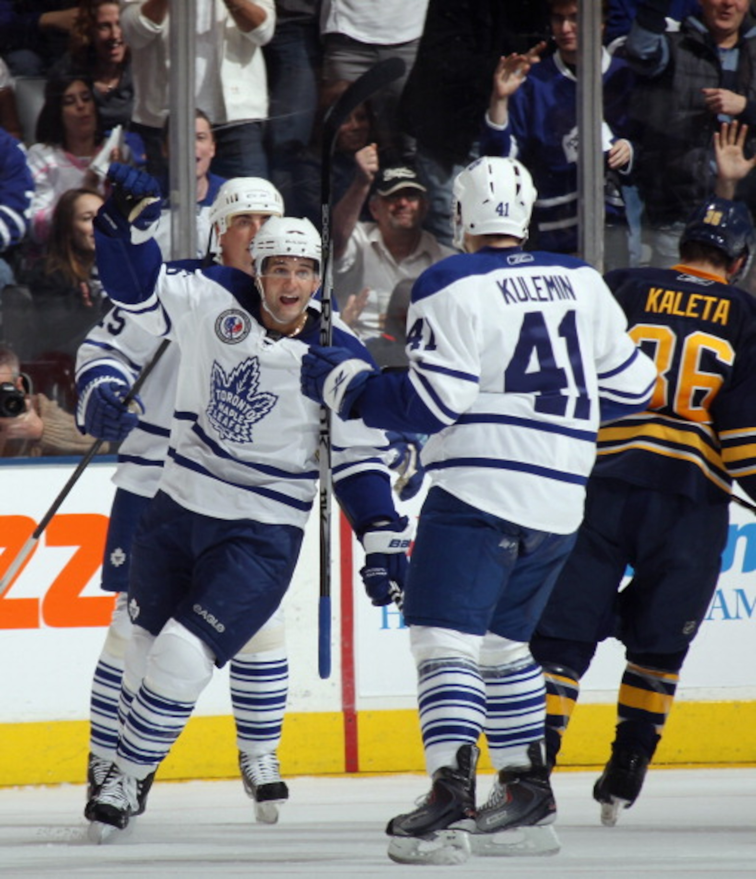 TORONTO, ON - NOVEMBER 06: Clarke MacArthur #16 of the Toronto Maple Leafs celebrtaes a goal by Nikolai Kulemin #41 against the Buffalo Sabres at the Air Canada Centre on November 6, 2010 in Toronto, Canada. The Sabres defeated the Maple Leafs 3-2. (Phot TORONTO, ON - NOVEMBER 06: Clarke MacArthur #16 of the Toronto Maple Leafs celebrtaes a goal by Nikolai Kulemin #41 against the Buffalo Sabres at the Air Canada Centre on November 6, 2010 in Toronto, Canada. The Sabres defeated the Maple Leafs 3-2. (Phot