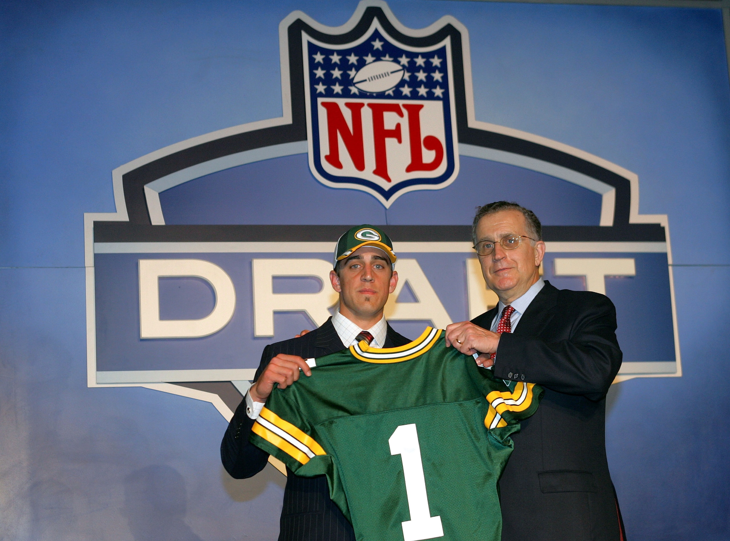 NEW YORK - APRIL 23: Quarterback Aaron Rodgers (California) poses with NFL Commissioner Paul Tagliabue after Rodgers was drafted 24th overall by the Green Bay Packers during the 70th NFL Draft on April 23, 2005 at the Jacob K. Javits Convention Center in NEW YORK - APRIL 23: Quarterback Aaron Rodgers (California) poses with NFL Commissioner Paul Tagliabue after Rodgers was drafted 24th overall by the Green Bay Packers during the 70th NFL Draft on April 23, 2005 at the Jacob K. Javits Convention Center in
