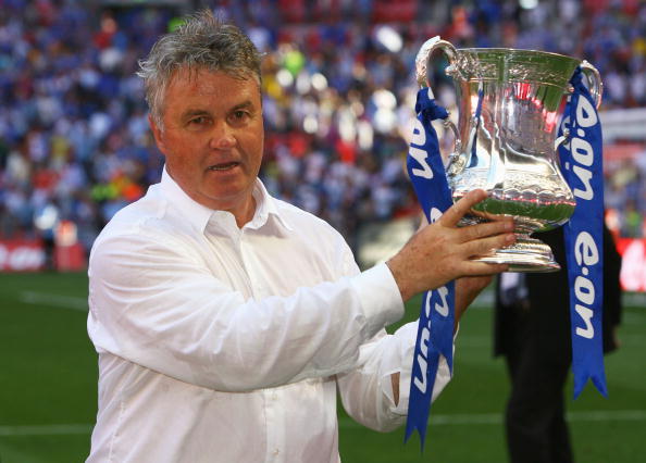 LONDON, ENGLAND - MAY 30:  Chelsea Manager Guus Hiddink lifts the trophy after the FA Cup sponsored by E.ON Final match between Chelsea and Everton at Wembley Stadium on May 30, 2009 in London, England.  (Photo by Alex Livesey/Getty Images)