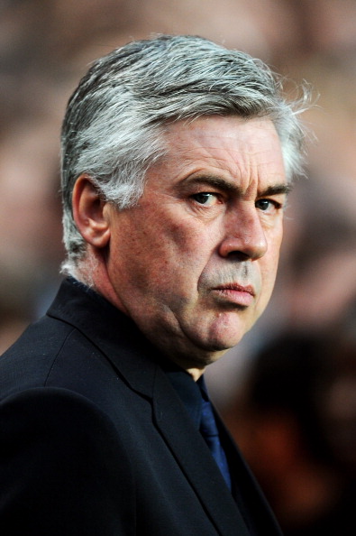 LONDON, ENGLAND - APRIL 06:  Carlo Ancelotti the Chelsea manager looks on prior to kickoff during the UEFA Champions League quarter final first leg match between Chelsea and Manchester United at Stamford Bridge on April 6, 2011 in London, England.  (Photo
