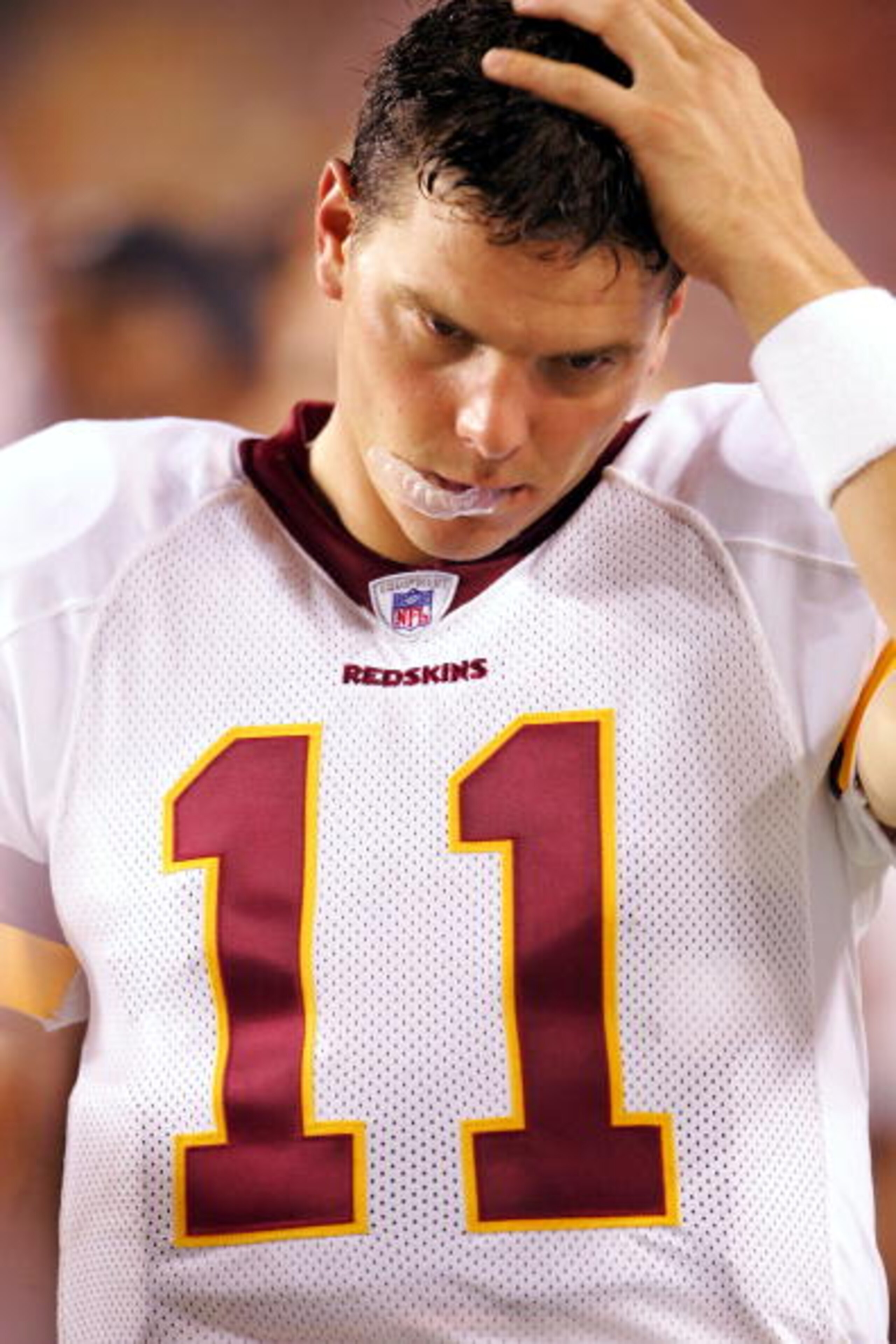 LANDOVER, MD - AUGUST 19: Quarterback Patrick Ramsey #11 of the Washington Redskins reacts from the sidelines during the second half of the preseason game against the Cincinnati Bengals on August 19, 2005 at FedEx Field in Landover, Maryland. Ramsey thre LANDOVER, MD - AUGUST 19: Quarterback Patrick Ramsey #11 of the Washington Redskins reacts from the sidelines during the second half of the preseason game against the Cincinnati Bengals on August 19, 2005 at FedEx Field in Landover, Maryland. Ramsey thre