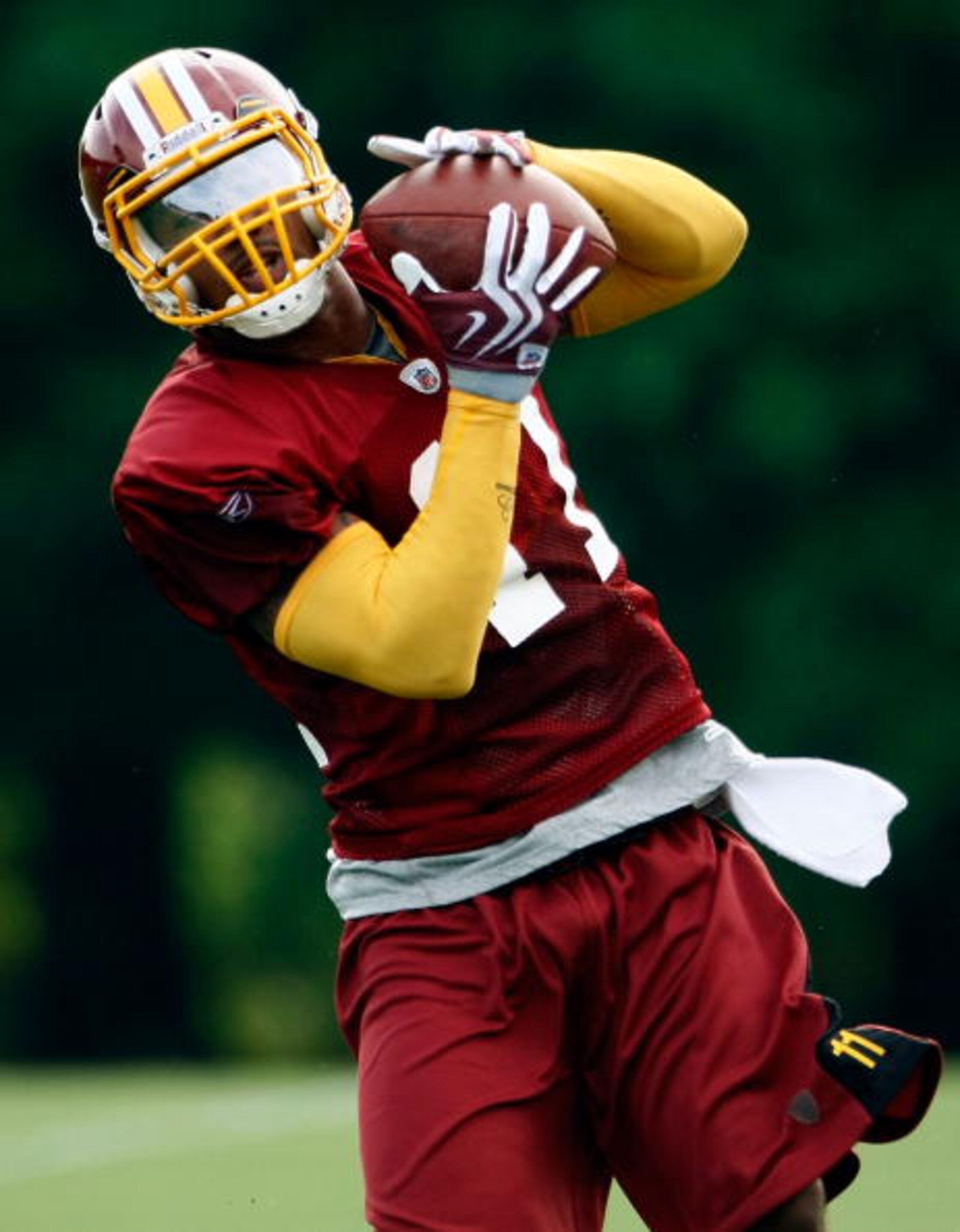 ASHBURN, VA - JULY 30: Washington Redskins wide receiver Devin Thomas (#11) catches a pass during drills on opening day of training camp July 30, 2009 in Ashburn, Virginia. (Photo by Win McNamee/Getty Images) ASHBURN, VA - JULY 30: Washington Redskins wide receiver Devin Thomas (#11) catches a pass during drills on opening day of training camp July 30, 2009 in Ashburn, Virginia. (Photo by Win McNamee/Getty Images)