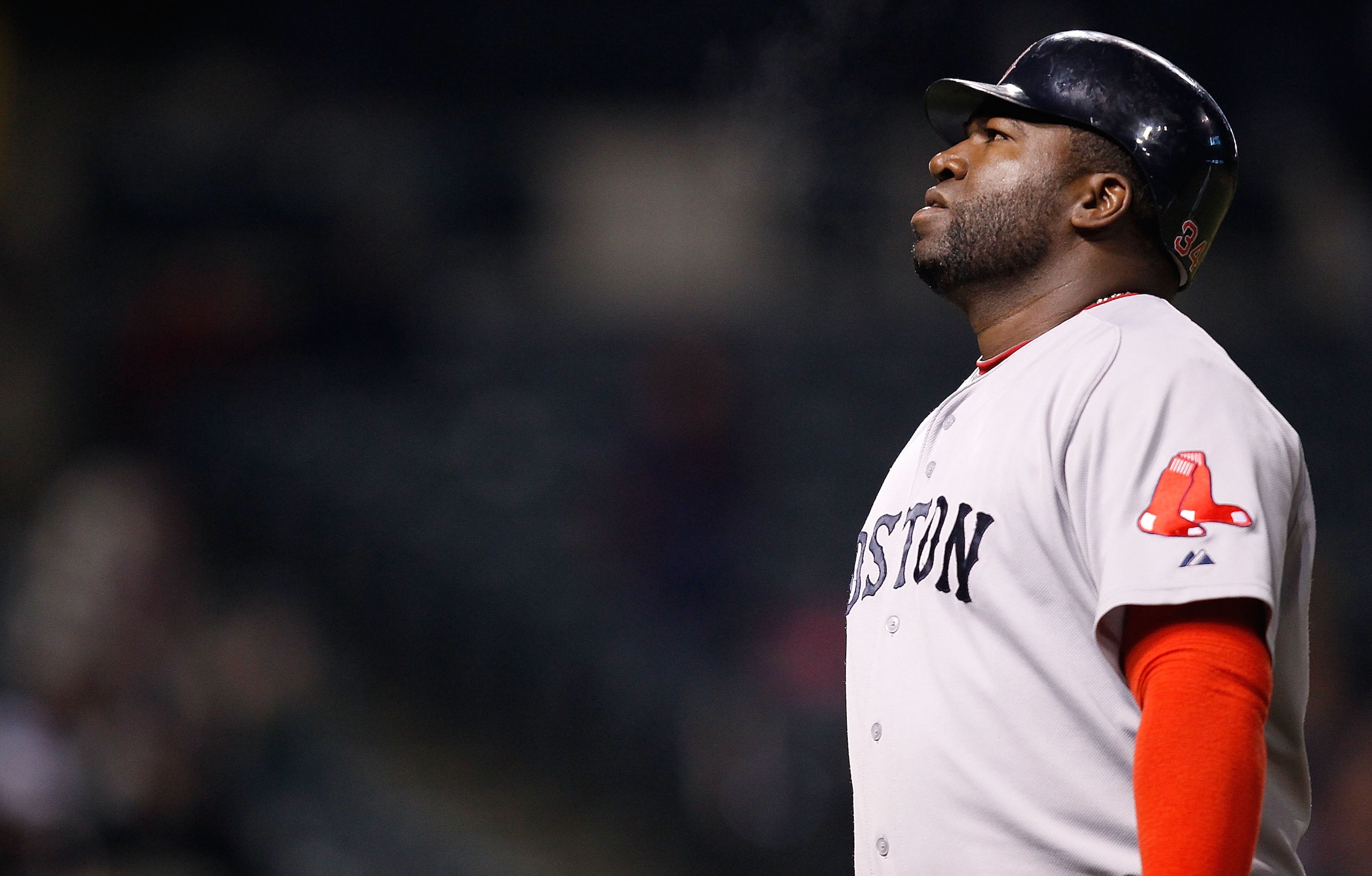 CLEVELAND - APRIL 06:  David Ortiz # 34 of the Boston Red Sox walks back to the dugout after grounding out against the Cleveland Indians during the game on April 6, 2011 at Progressive Field in Cleveland, Ohio.  (Photo by Jared Wickerham/Getty Images)