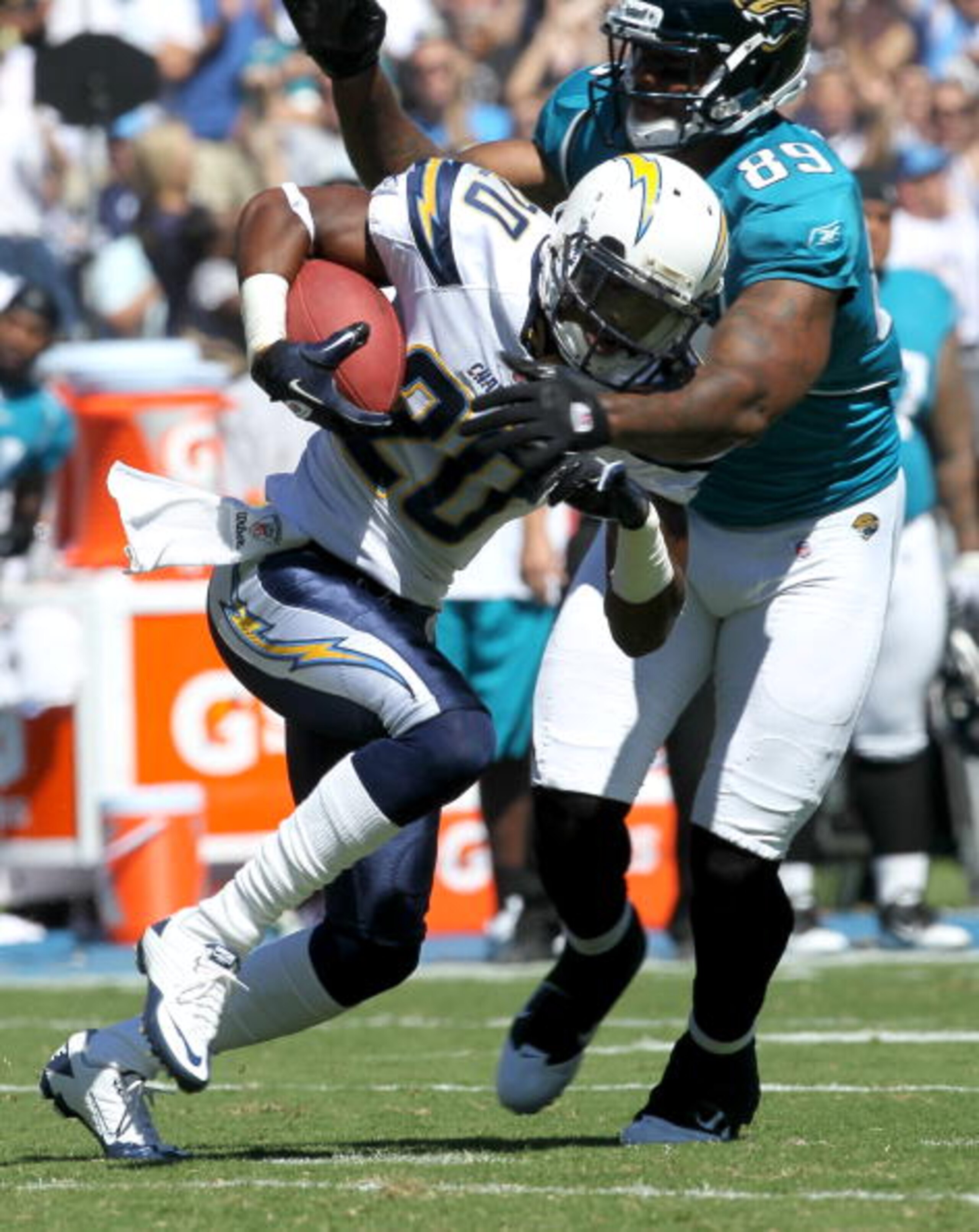 SAN DIEGO - SEPTEMBER 19: Cornerback Antoine Cason #20 of the San Diego Chargers returns his second interception of the game as he runs into tight end Marcedes Lewis #89 of the Jacksonville Jaguars at Qualcomm Stadium on September 19, 2010 in San Diego, SAN DIEGO - SEPTEMBER 19: Cornerback Antoine Cason #20 of the San Diego Chargers returns his second interception of the game as he runs into tight end Marcedes Lewis #89 of the Jacksonville Jaguars at Qualcomm Stadium on September 19, 2010 in San Diego,