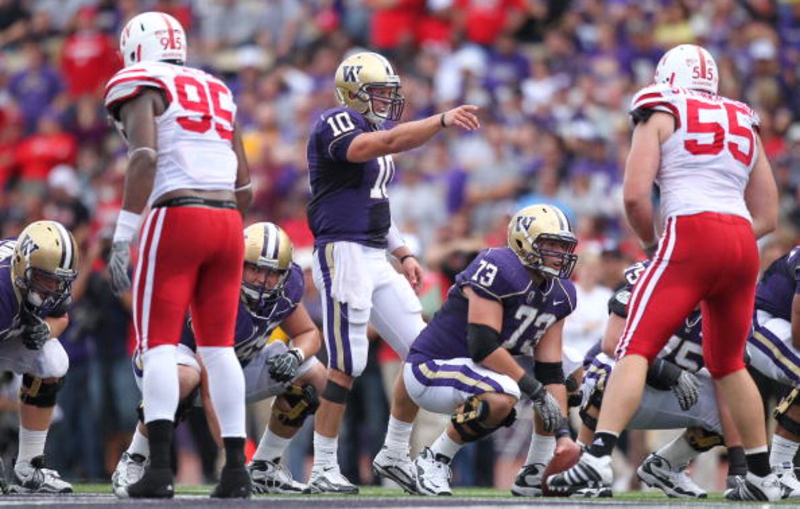 SEATTLE - SEPTEMBER 18: Quarterback Jake Locker #10 of the Washington Huskies points at the line of scrimmage against the Nebraska Cornhuskers on September 18, 2010 at Husky Stadium in Seattle, Washington. (Photo by Otto Greule Jr/Getty Images)