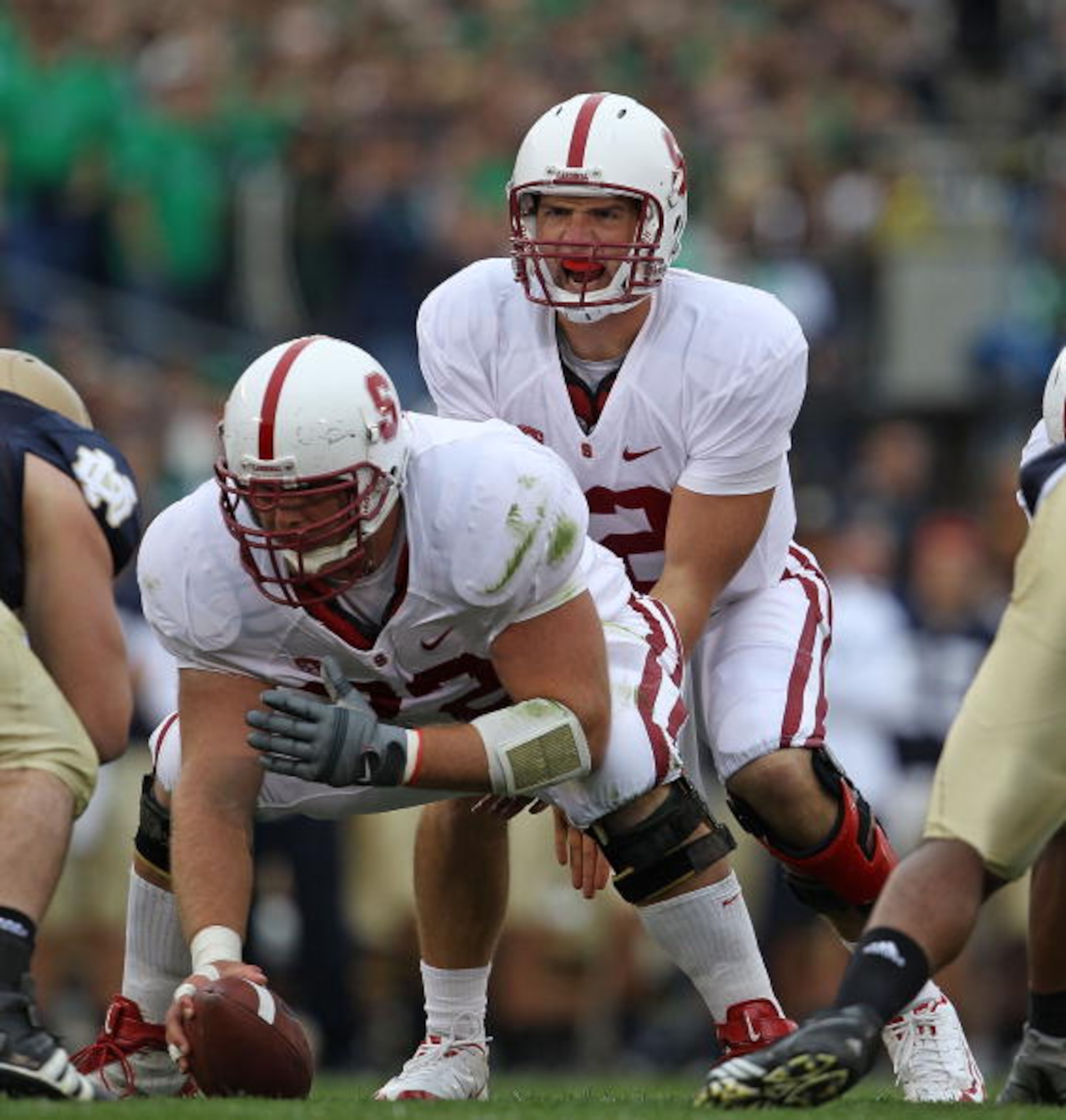 SOUTH BEND, IN - SEPTEMBER 25: Andrew Luck #12 of the Stanford Cardinal calls the signals as Chase Beeler #72 prepares to snap the ball against the Notre Dame Fighting Irish at Notre Dame Stadium on September 25, 2010 in South Bend, Indiana. Stanford defe