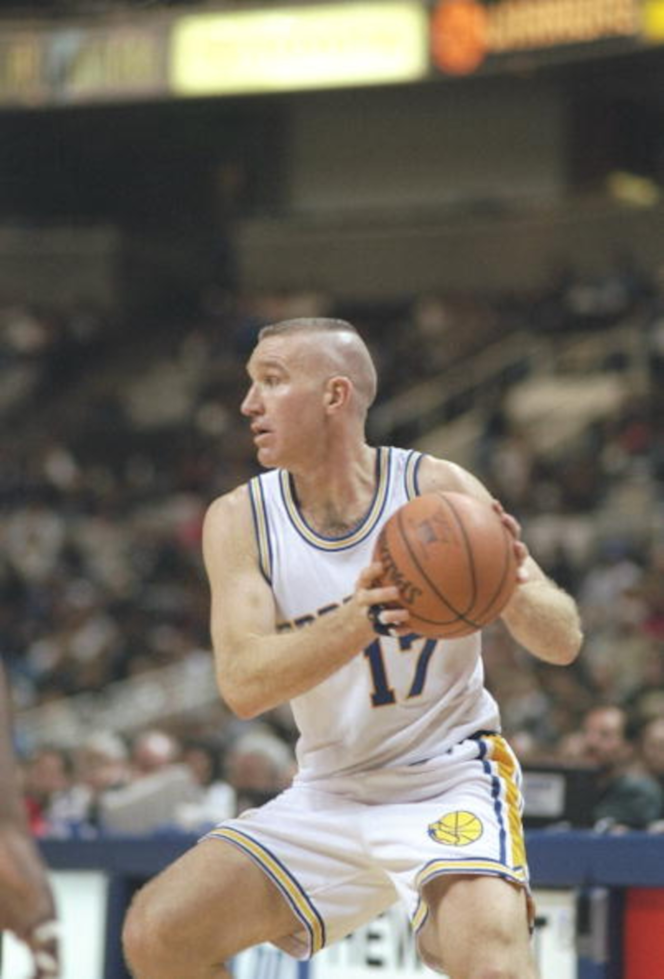 28 Nov 1996: Forward Chris Mullin of the Golden State Warriors holds the ball during a game against the New Jersey Nets at the San Jose Arena in San Jose, California. The Warriors won the game 124-118. 28 Nov 1996: Forward Chris Mullin of the Golden State Warriors holds the ball during a game against the New Jersey Nets at the San Jose Arena in San Jose, California. The Warriors won the game 124-118.