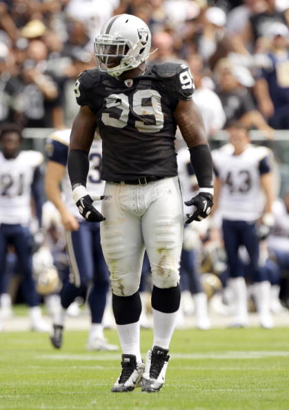 OAKLAND, CA - SEPTEMBER 19:  Lamarr Houston #99 of the Oakland Raiders in action during their game against the St. Louis Rams at the Oakland-Alameda County Coliseum on September 19, 2010 in Oakland, California.  (Photo by Ezra Shaw/Getty Images)