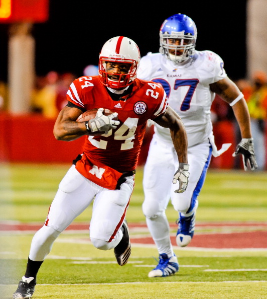 LINCOLN, NE - NOVEMBER 13: Niles Paul #24 of the Nebraska Cornhuskers finishes off a reception against the Kansas Jayhawks during their game at Memorial Stadium on November 13, 2010 in Lincoln, Nebraska. Nebraska Defeated Kansas 20-3. (Photo by Eric Franc