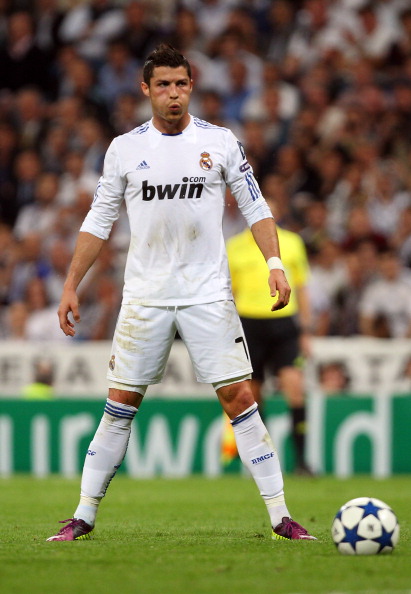 MADRID, SPAIN - APRIL 05: Cristiano Ronaldo of Real Madrid prepares for a free kick during the UEFA Champions League Quarter Final first leg match between Real Madrid and Tottenham Hotspur at Estadio Santiago Bernabeu on April 5, 2011 in Madrid, Spain.  (