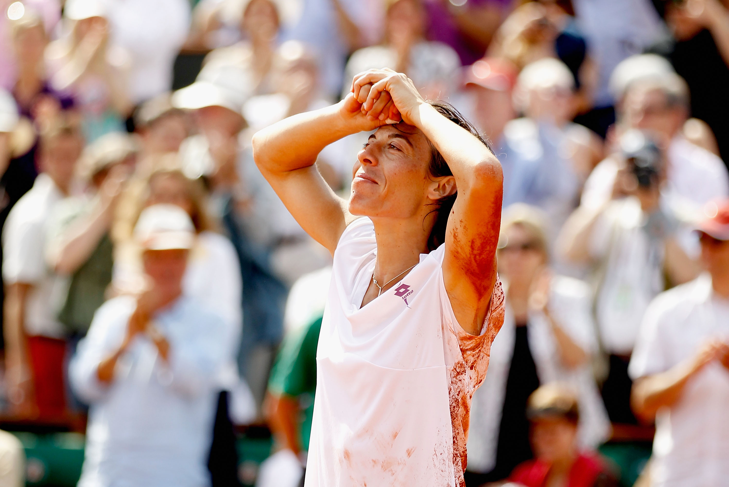 PARIS - JUNE 05:  Francesca Schiavone of Italy celebrates winning championship point during women's singles final match between Francesca Schiavone of Italy and Samantha Stosur of Australia on day fourteen of the French Open at Roland Garros on June 5, 20