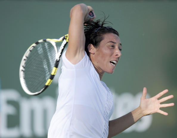 INDIAN WELLS, CA - MARCH 11:  Francesca Schiavone of Italy hits a forehand in her match against Zuzana Ondraskova of The Czech Republic during the BNP Paribas Open at the Indian Wells Tennis Garden on March 11, 2011 in Indian Wells, California.  (Photo by