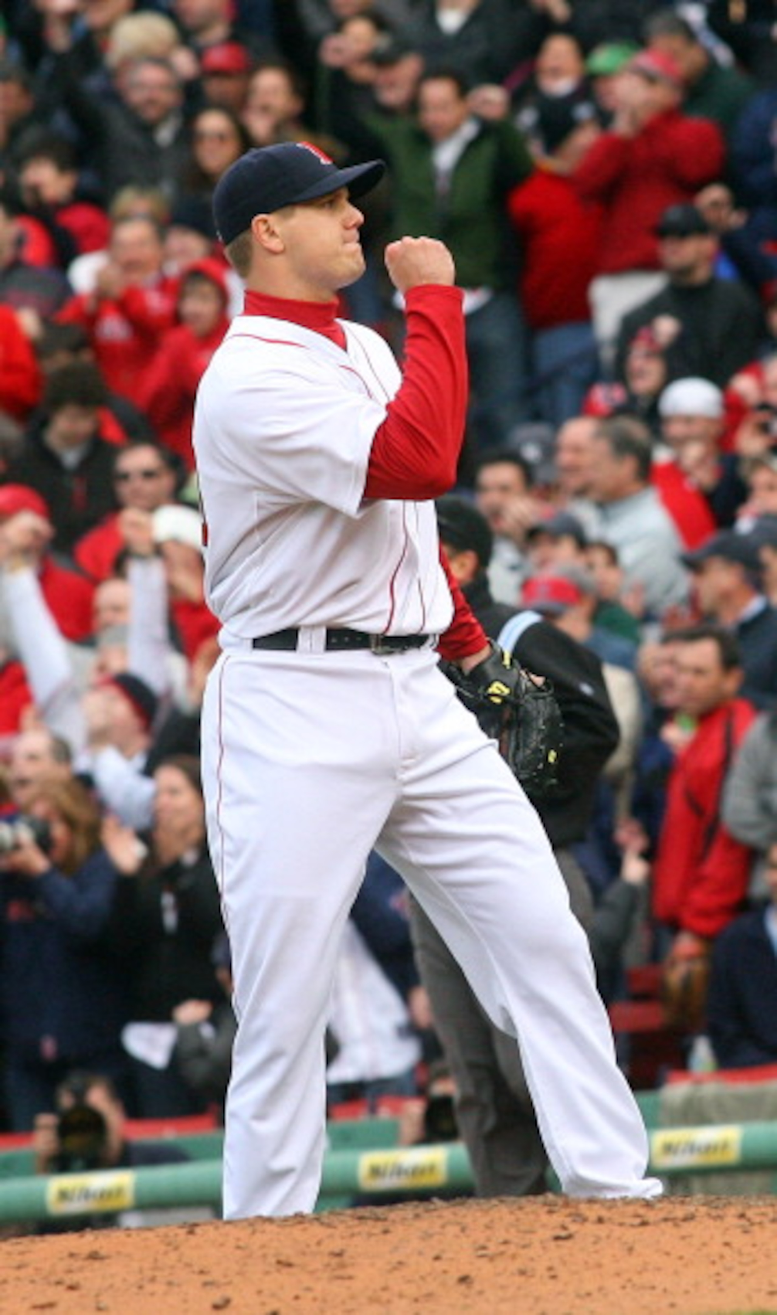 BOSTON, MA - APRIL 8:   Jonathan Papelbon #58 of the Boston Red Sox reacts after striking out Derek Jeter #2 of the New York Yankees in the ninth inning at Fenway Park,  April 2, 2011 in Boston, Massachusetts. (Photo by Gail Oskin/Getty Images)